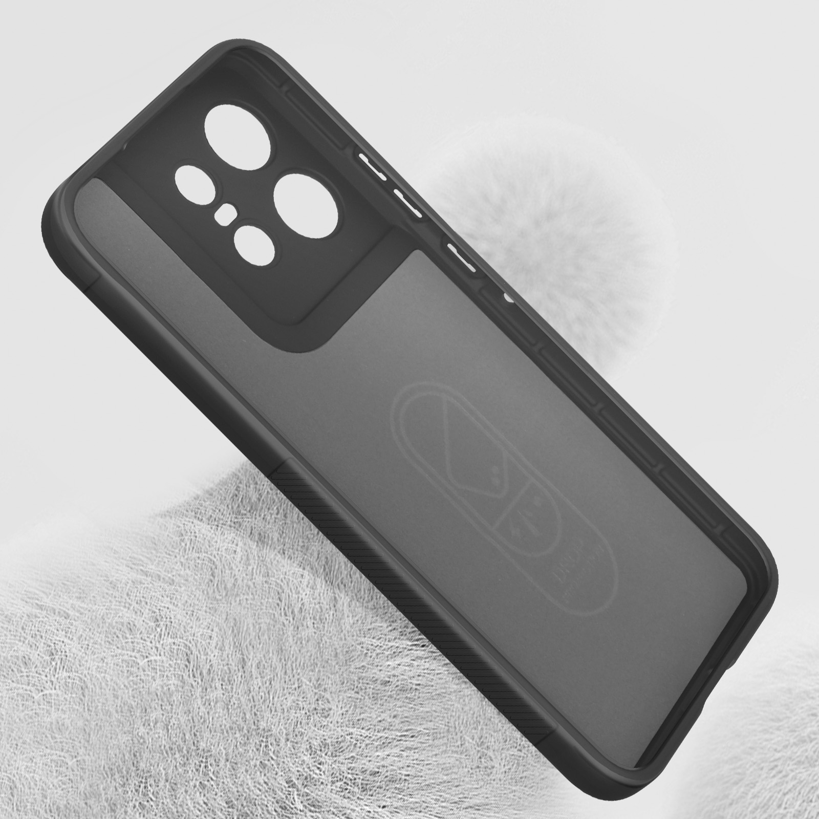 Coque de téléphone noire, design pilule, sur surface texturée, fond blanc.