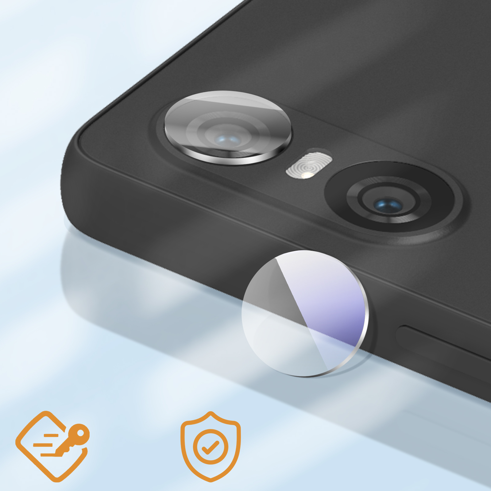 Un telefono nero con un obiettivo della fotocamera su sfondo blu, con un obiettivo separato e due icone.