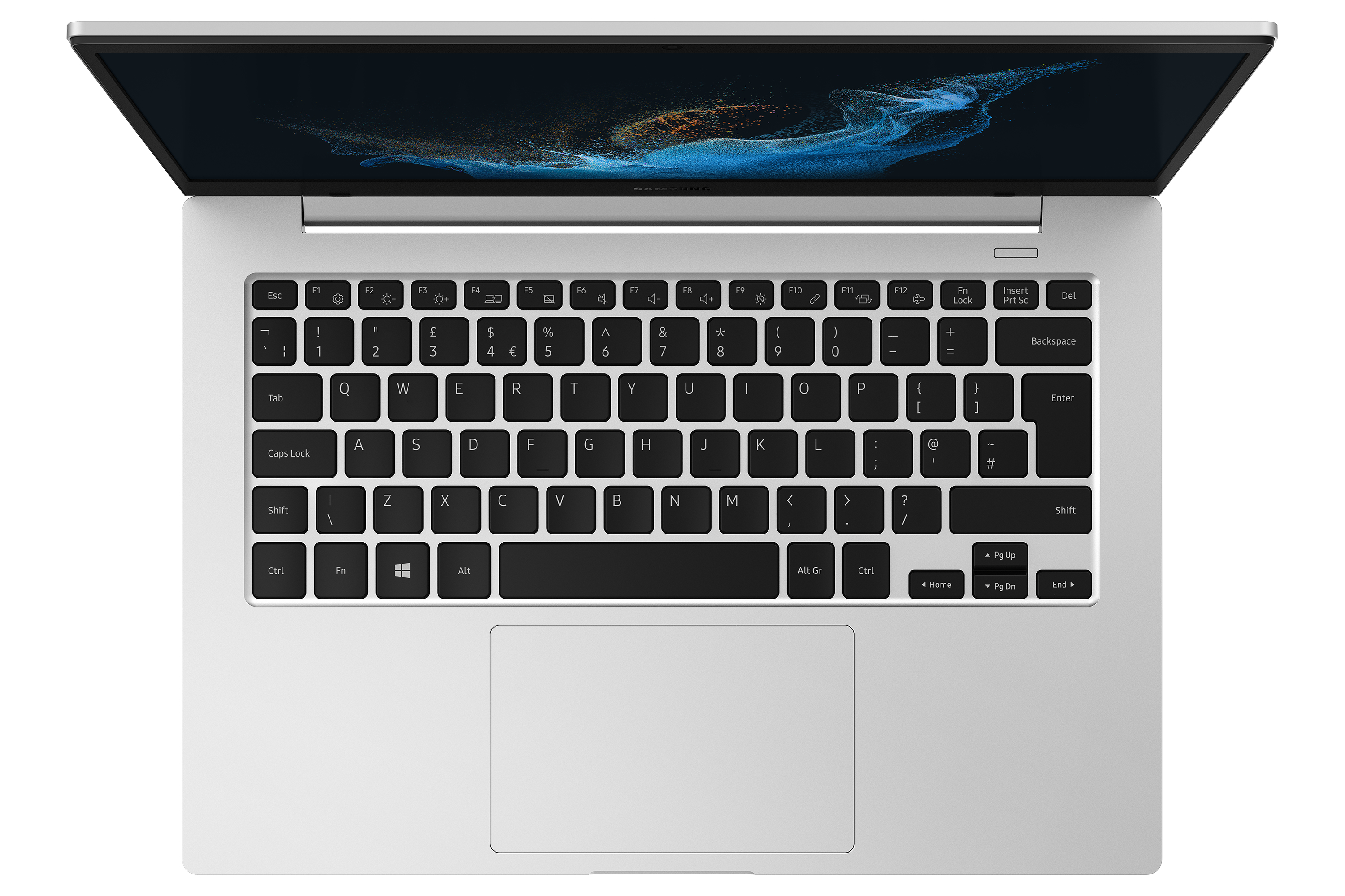 Srebrny laptop, widok z góry. Klawiatura jest widoczna, z czarnymi klawiszami. Ekran jest włączony.