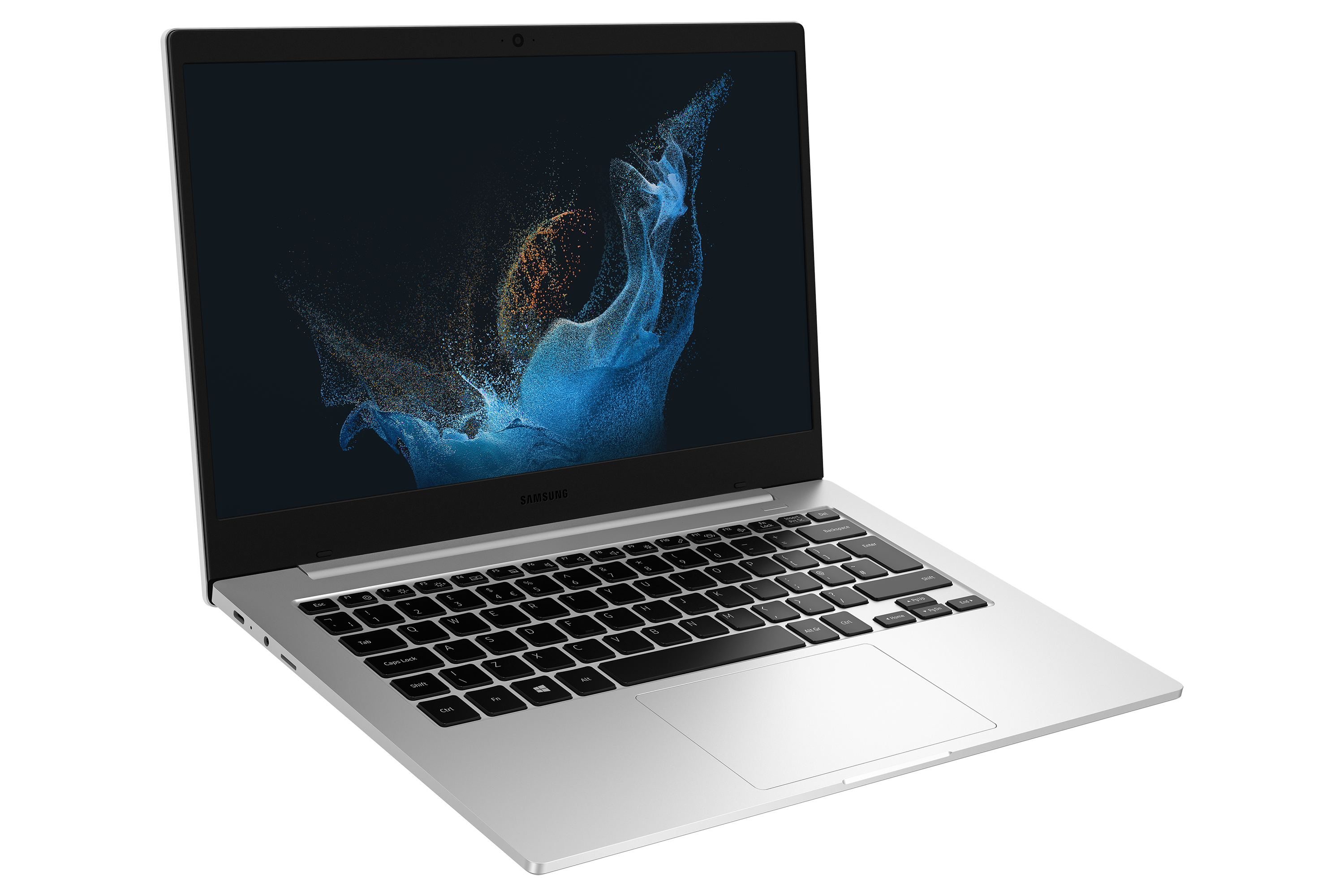 Srebrny laptop Samsung otwarty pod kątem, widoczny ekran z abstrakcyjną grafiką. Czarna klawiatura. Białe tło.