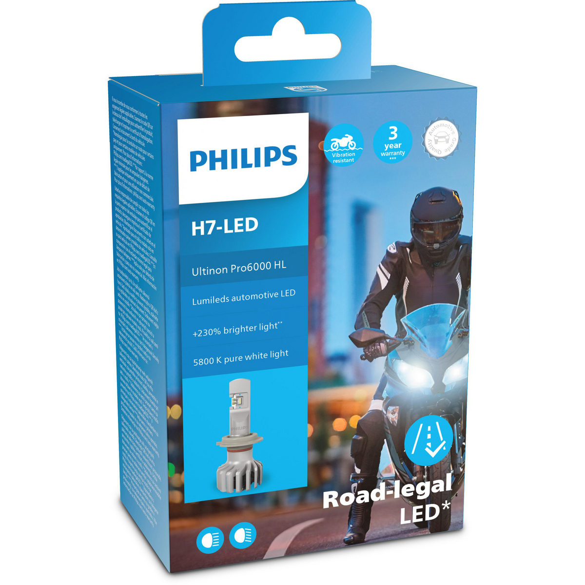 Verpackte Philips H7-LED-Scheinwerferlampen. Zeigt ein Motorrad und eine Person.