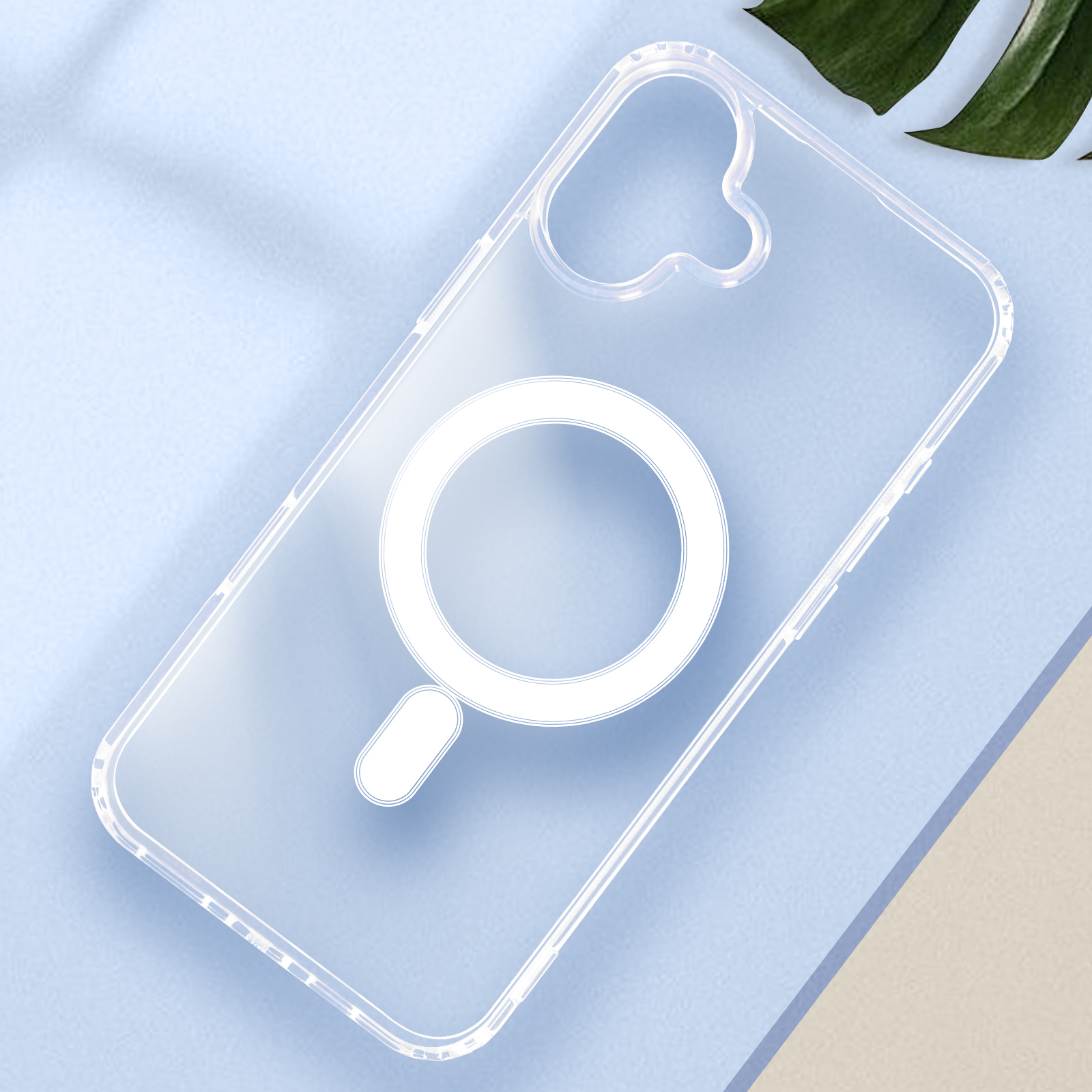 Una custodia trasparente per telefono con un design a cerchio bianco su una superficie blu.