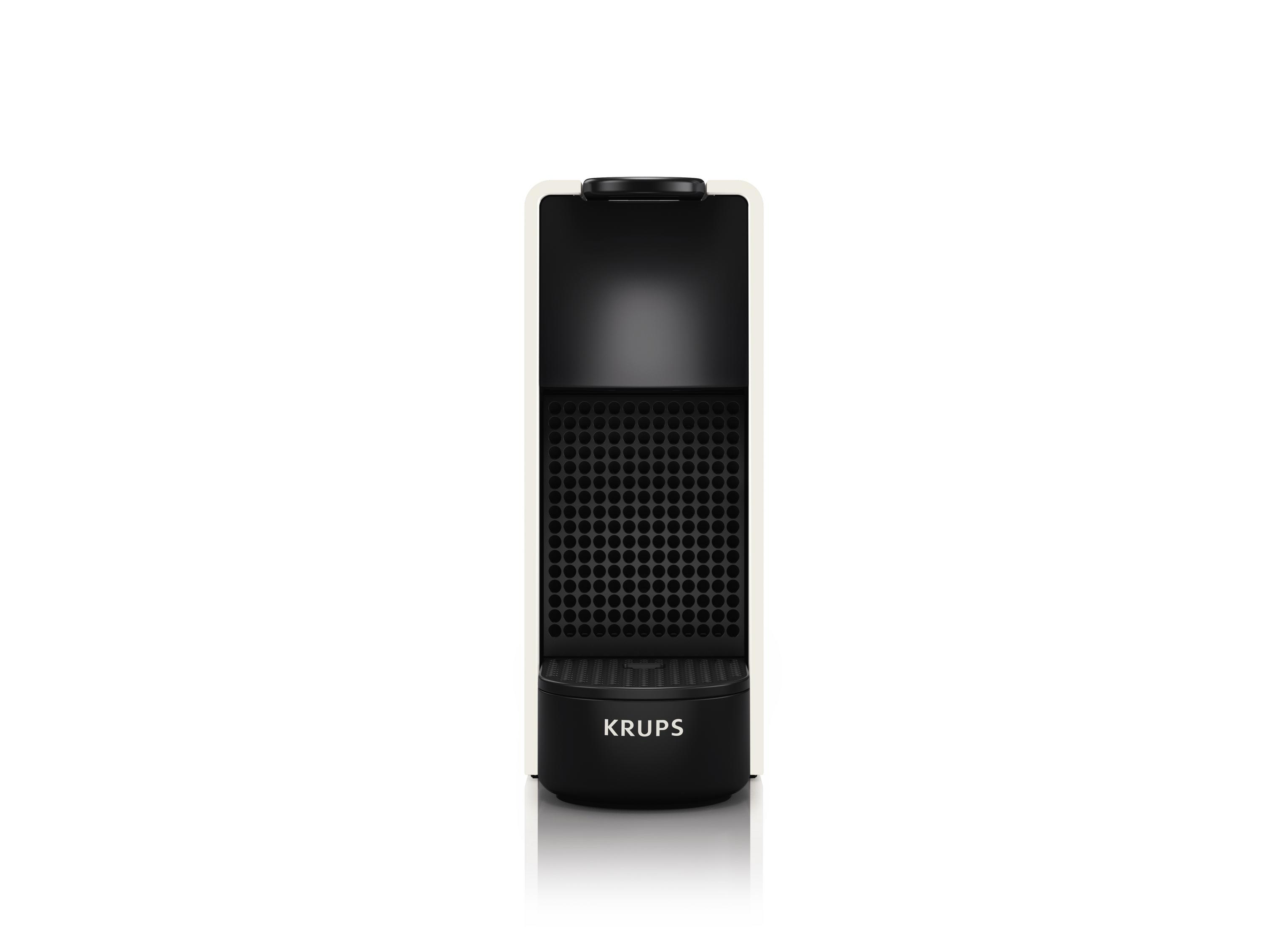Una macchina da caffè Krups bianca e nera. Ha un design alto e snello con una base arrotondata.