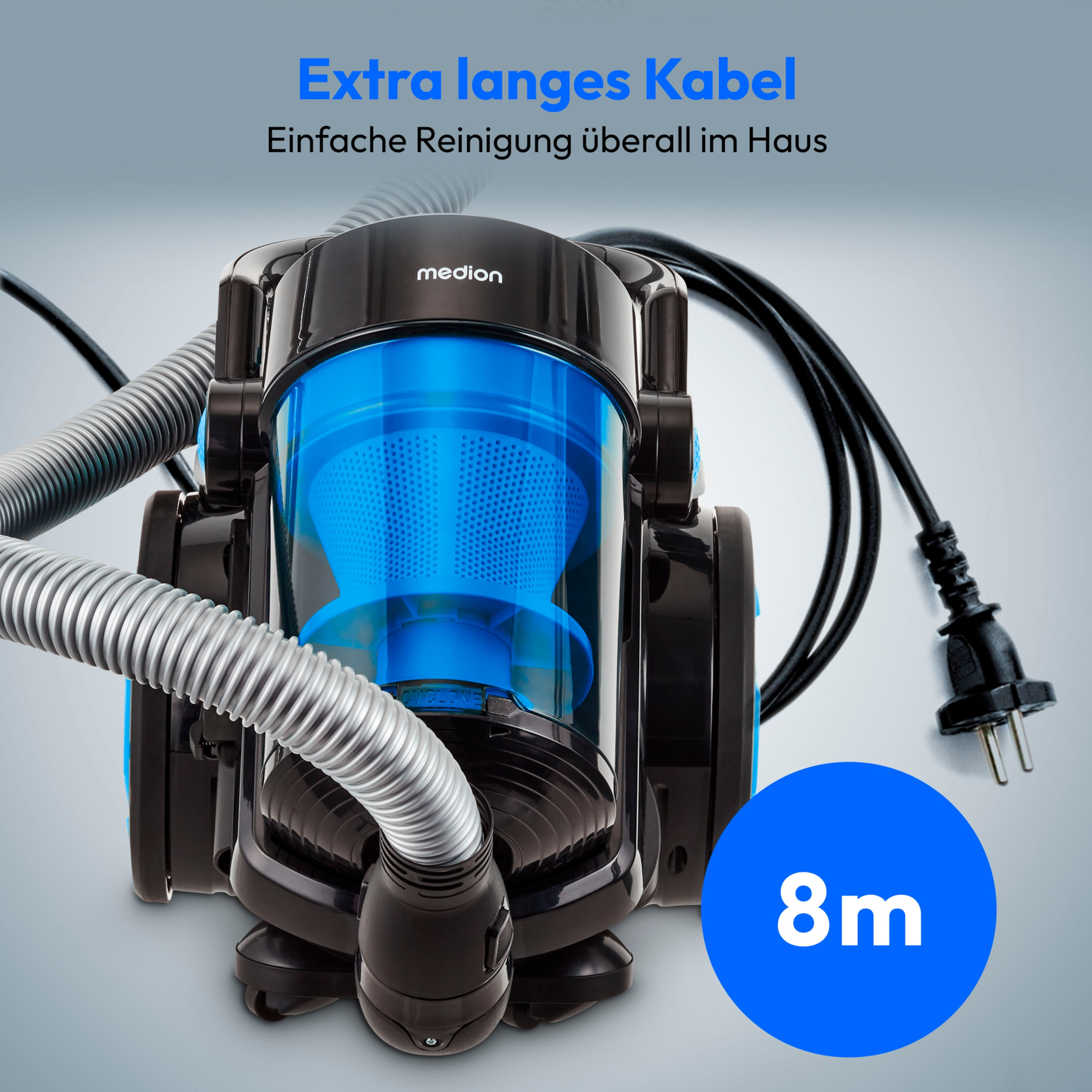 Aspiradora negra y azul con un depósito azul. La aspiradora tiene una manguera larga.