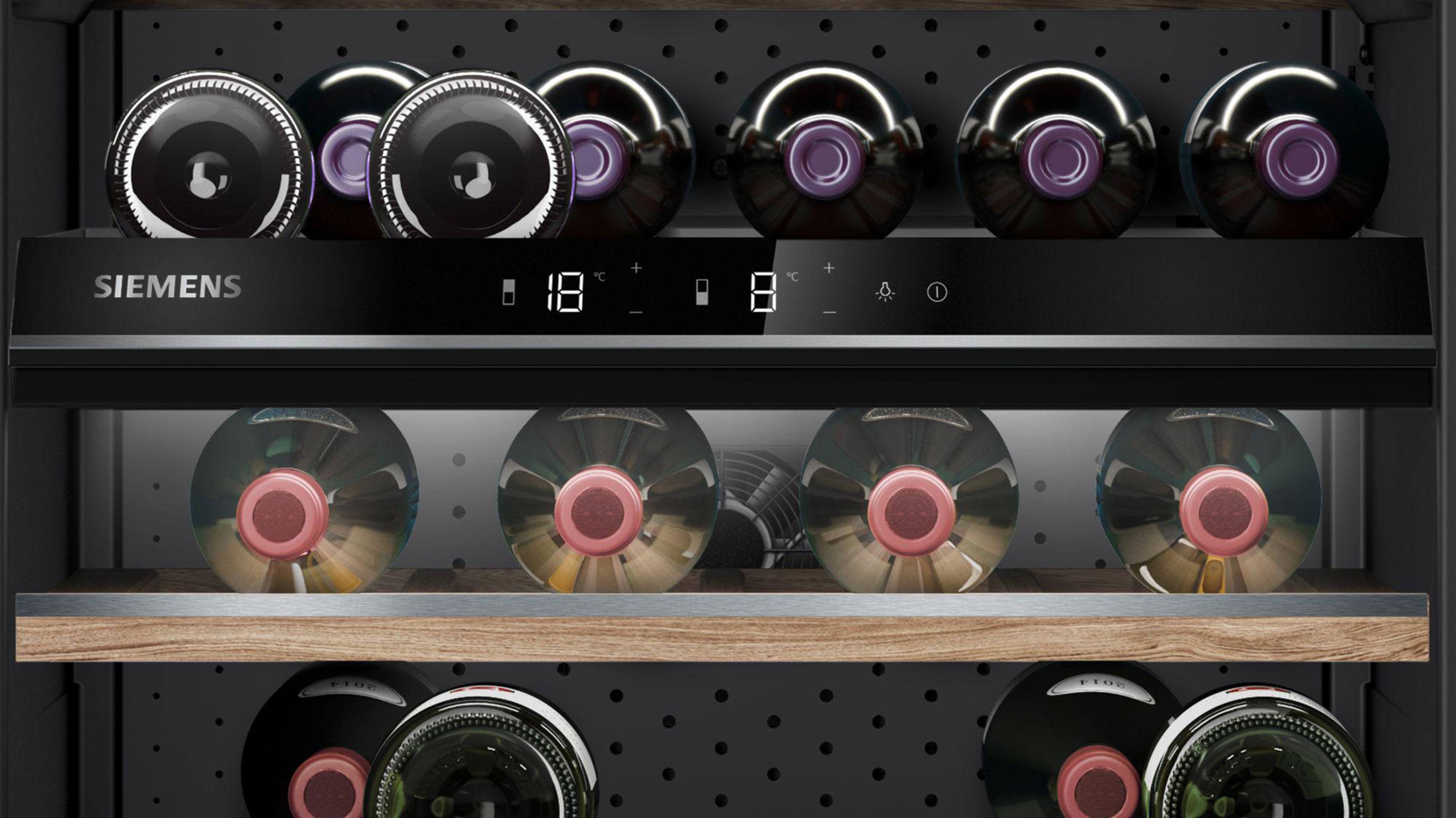 Wine cooler with bottles visible. Siemens brand. Bottles in two rows. Temperature display.
