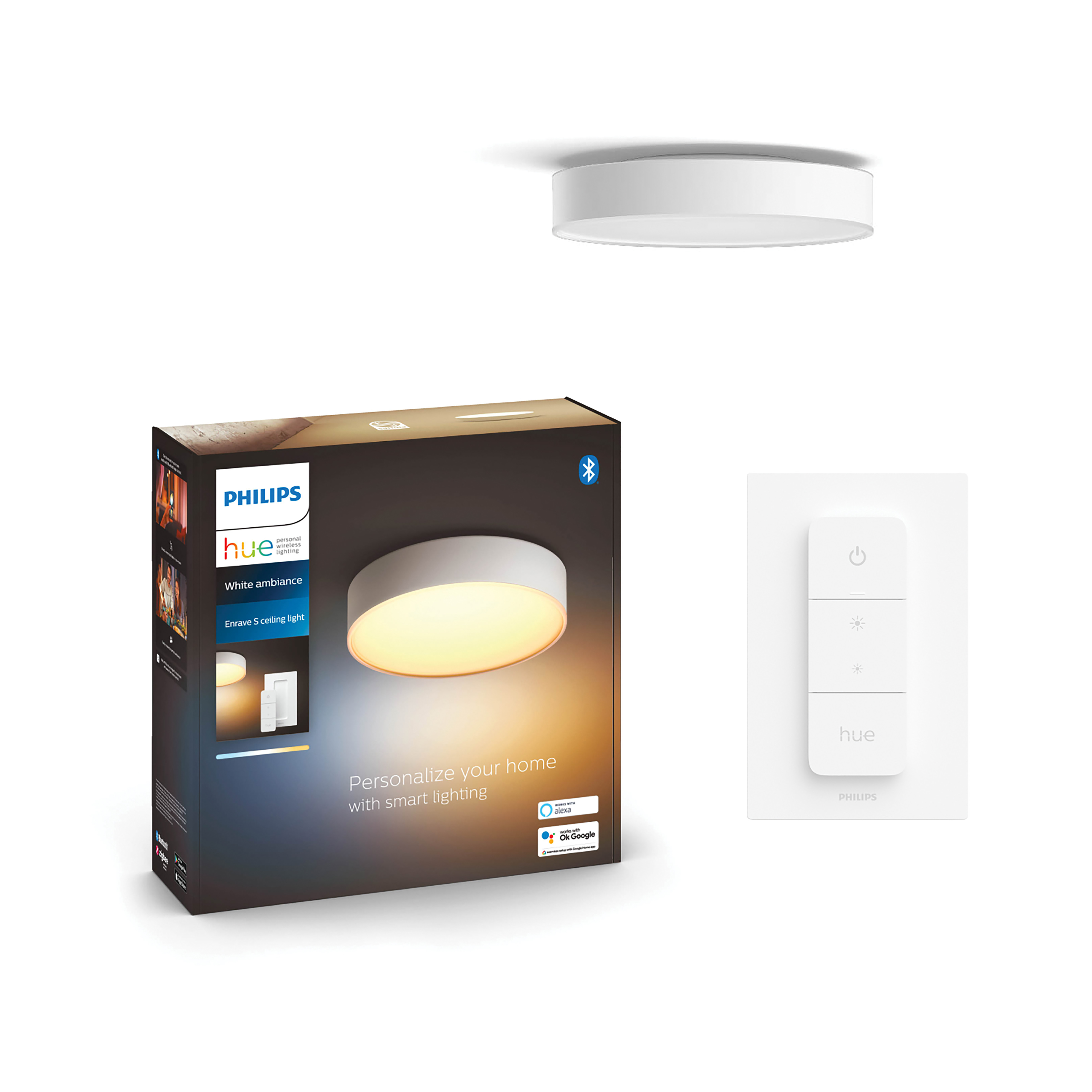 Zestaw oświetlenia inteligentnego Philips Hue. Pudełko, lampa sufitowa i pilot. Białe tło.