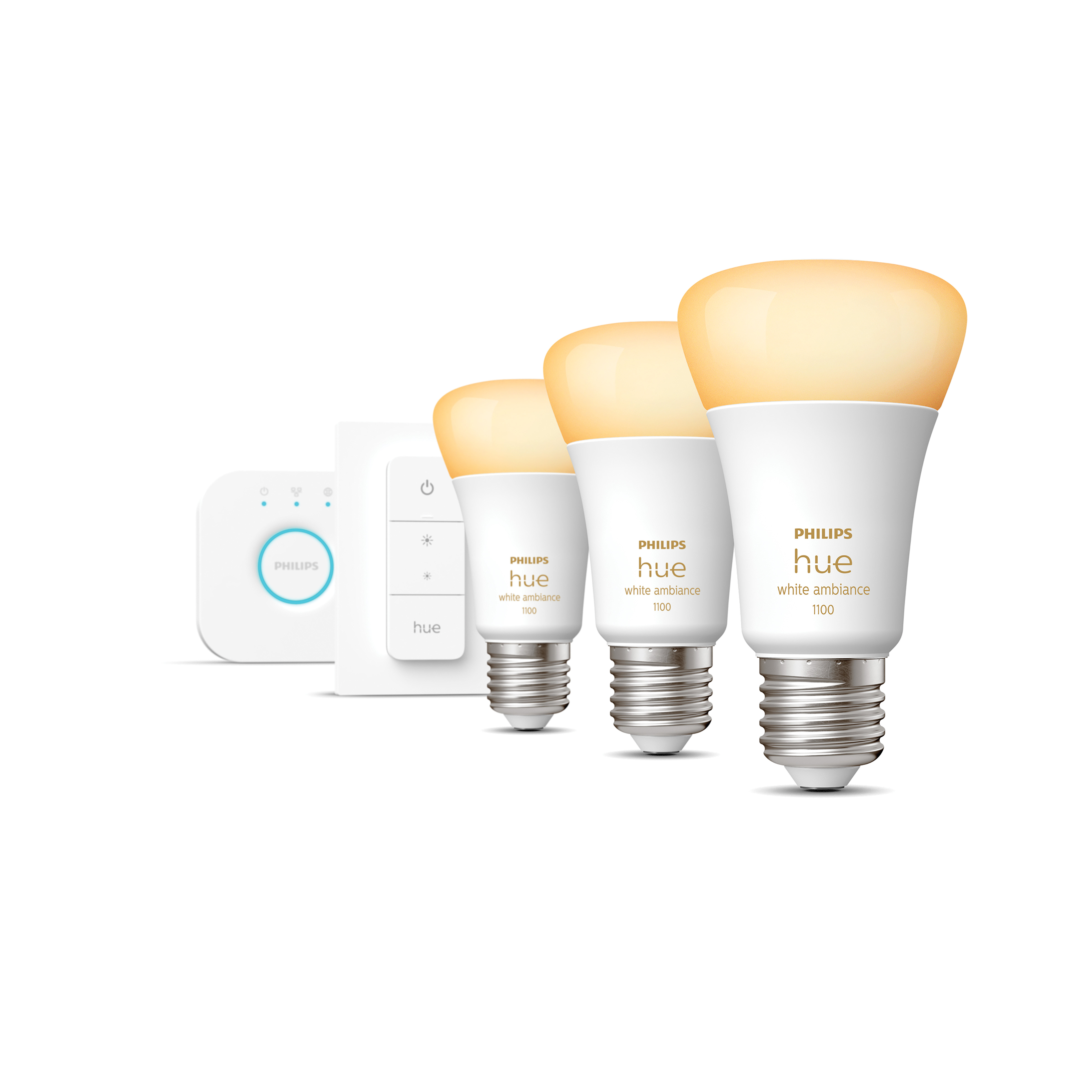 Tres bombillas inteligentes Philips Hue blancas con un puente y un regulador.