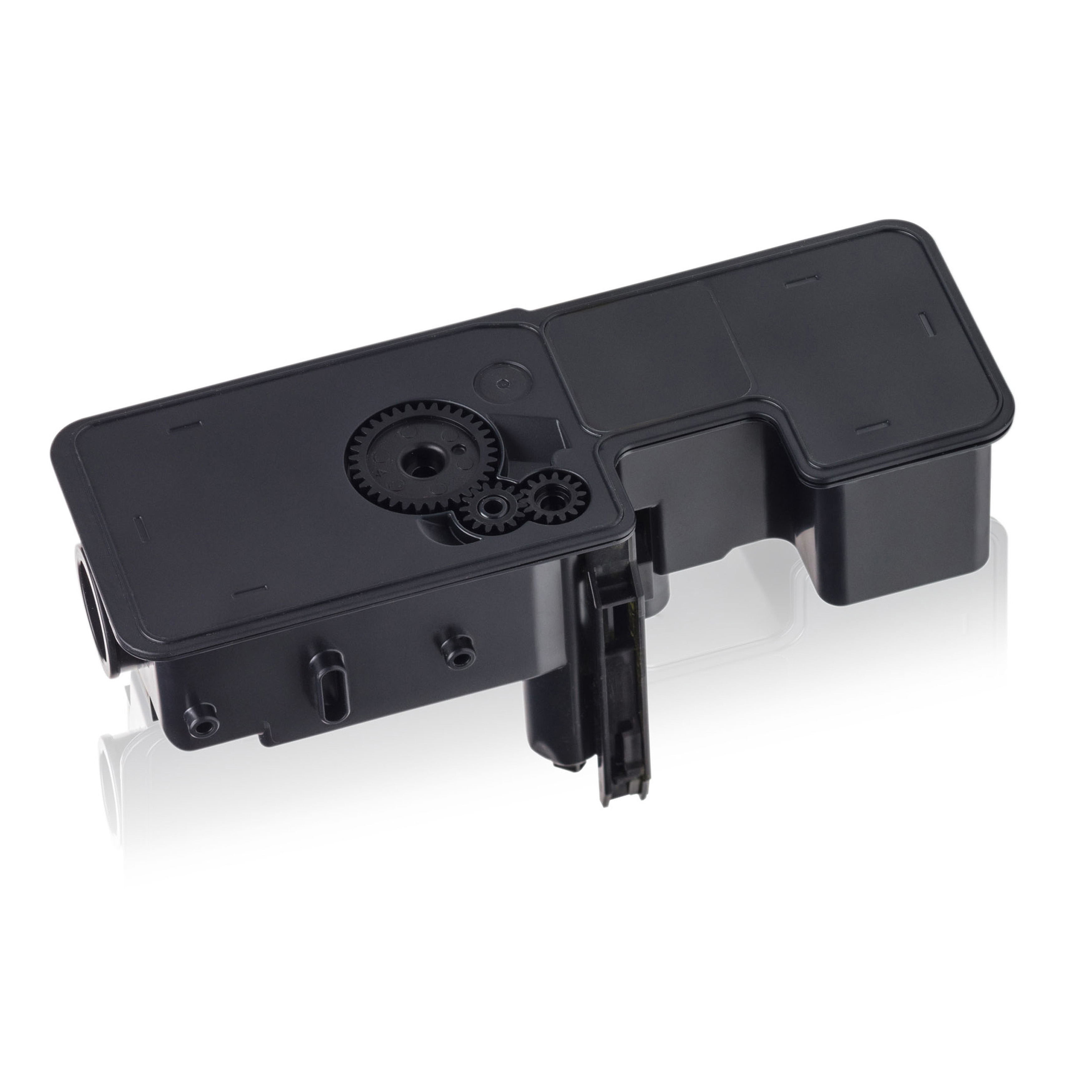 Czarny plastikowy element drukarki z widocznymi wewnątrz zębatkami, umieszczony na białej, odbijającej powierzchni.