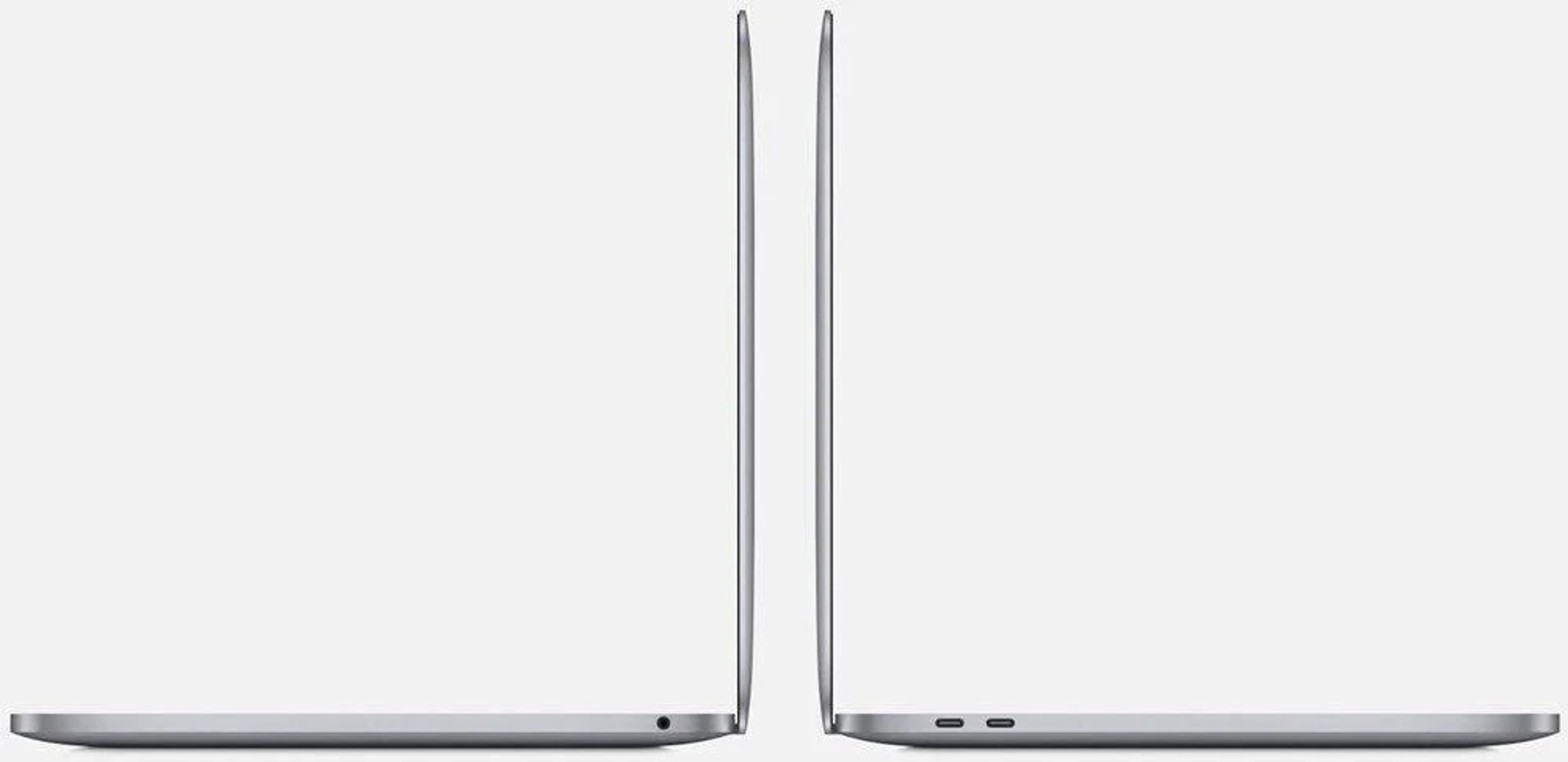 Zwei silberne Laptops nebeneinander, die ihre Profile zeigen. Die Bildschirme sind geschlossen.