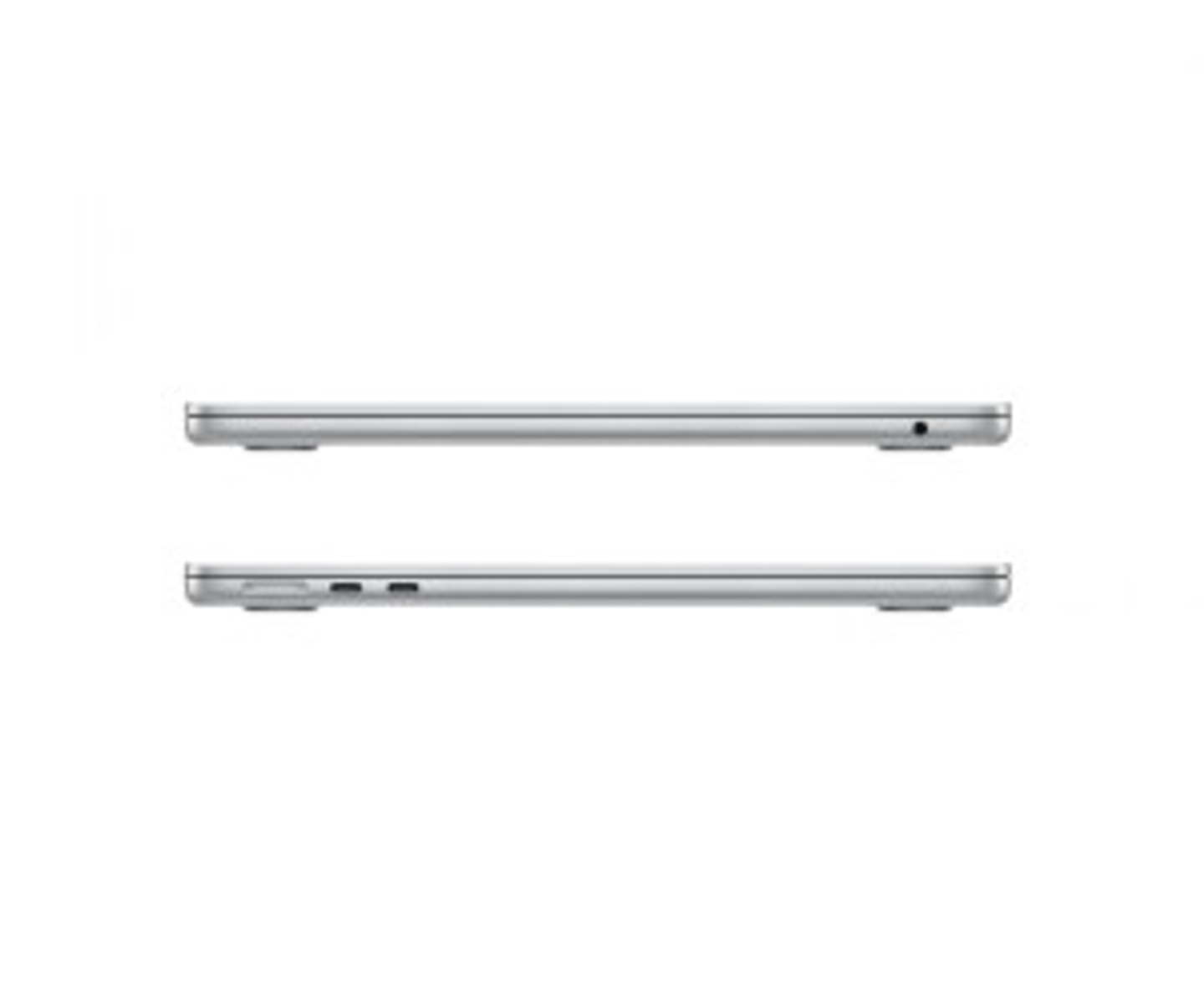 Zwei silberne Laptops nebeneinander, die ihre Profile zeigen. Die Bildschirme sind geschlossen.