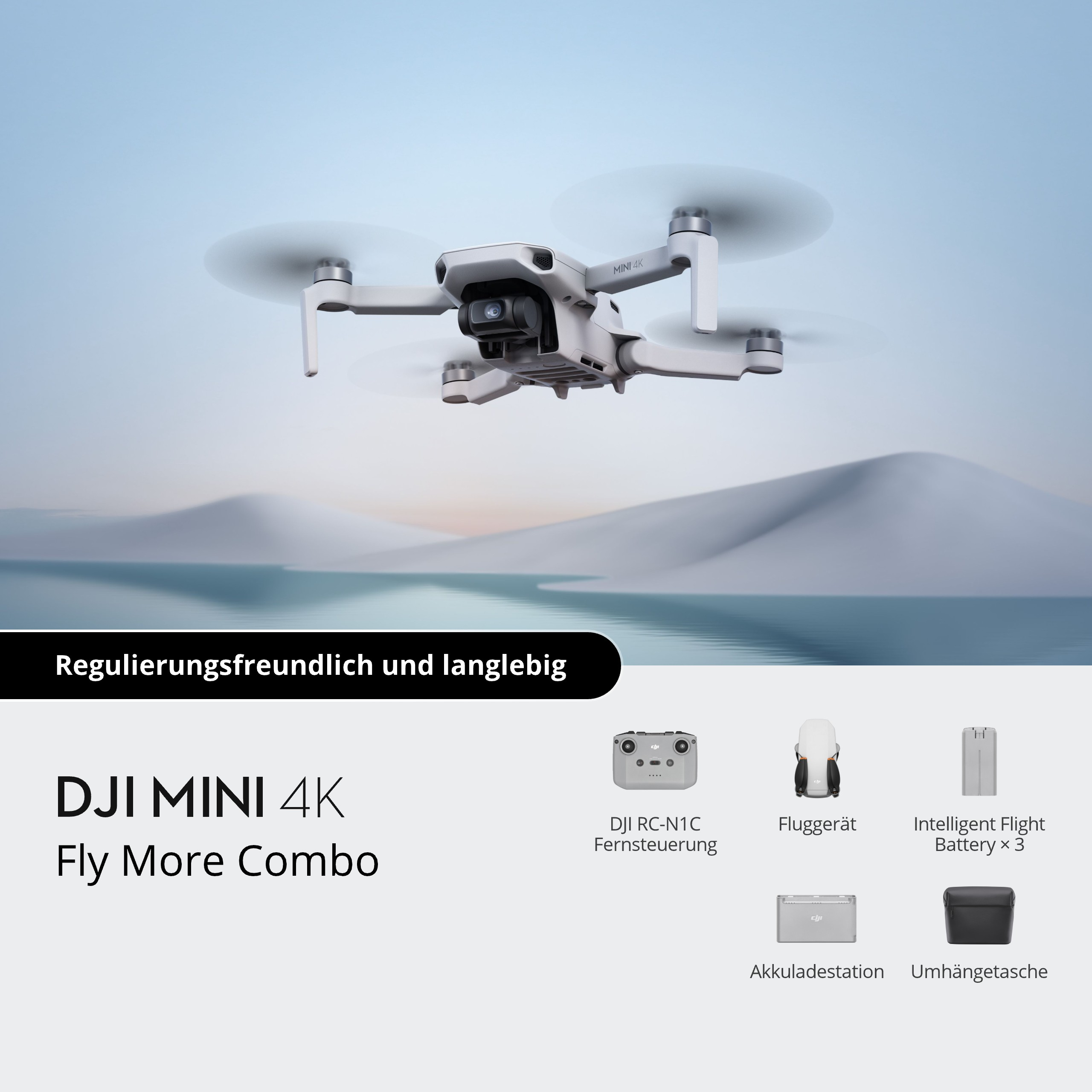 Biały dron DJI Mini 4K w powietrzu, z akcesoriami poniżej. Niebieskie tło gór.