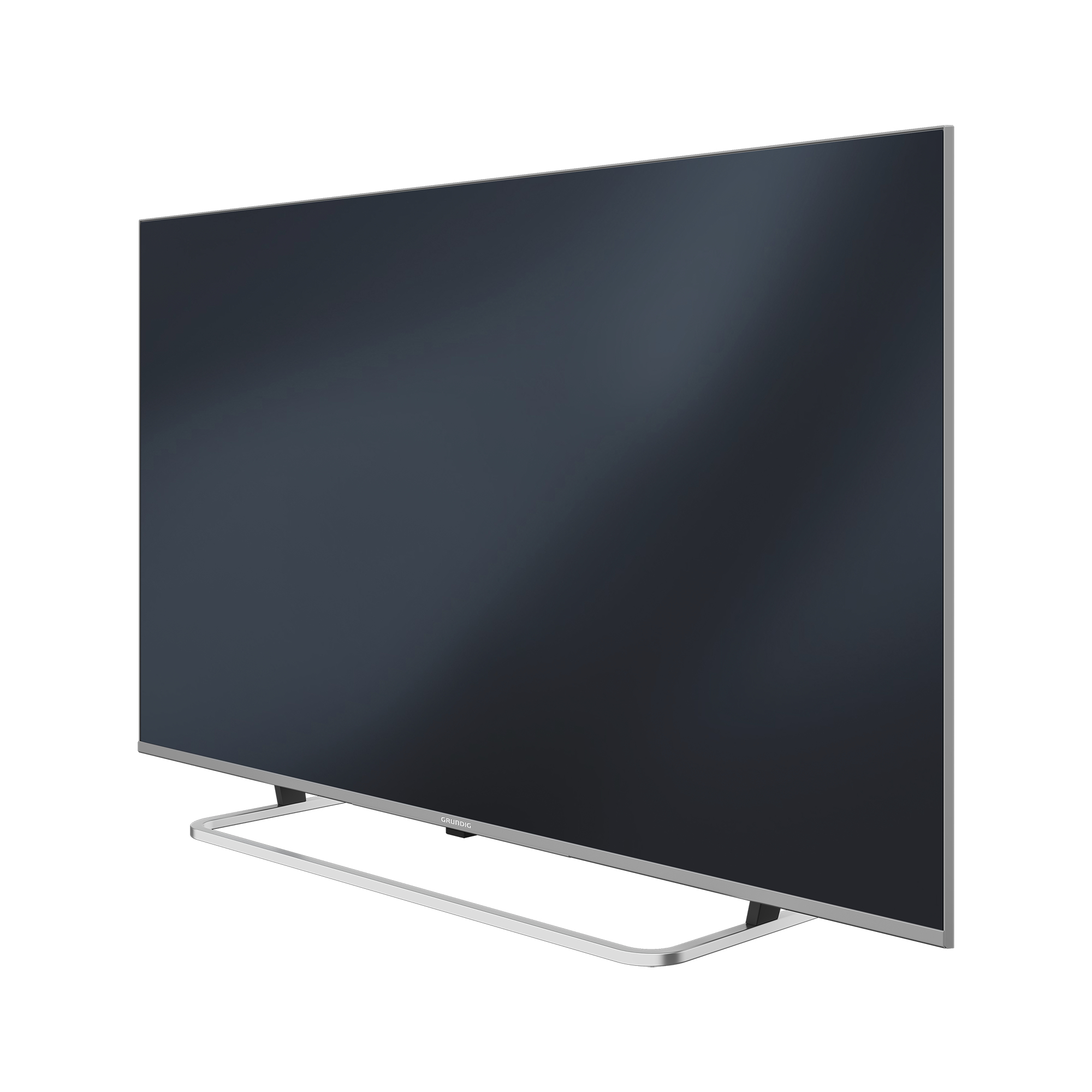 Un televisor grande sobre un soporte con pantalla negra, ligeramente inclinado. El soporte es plateado, el fondo es blanco.