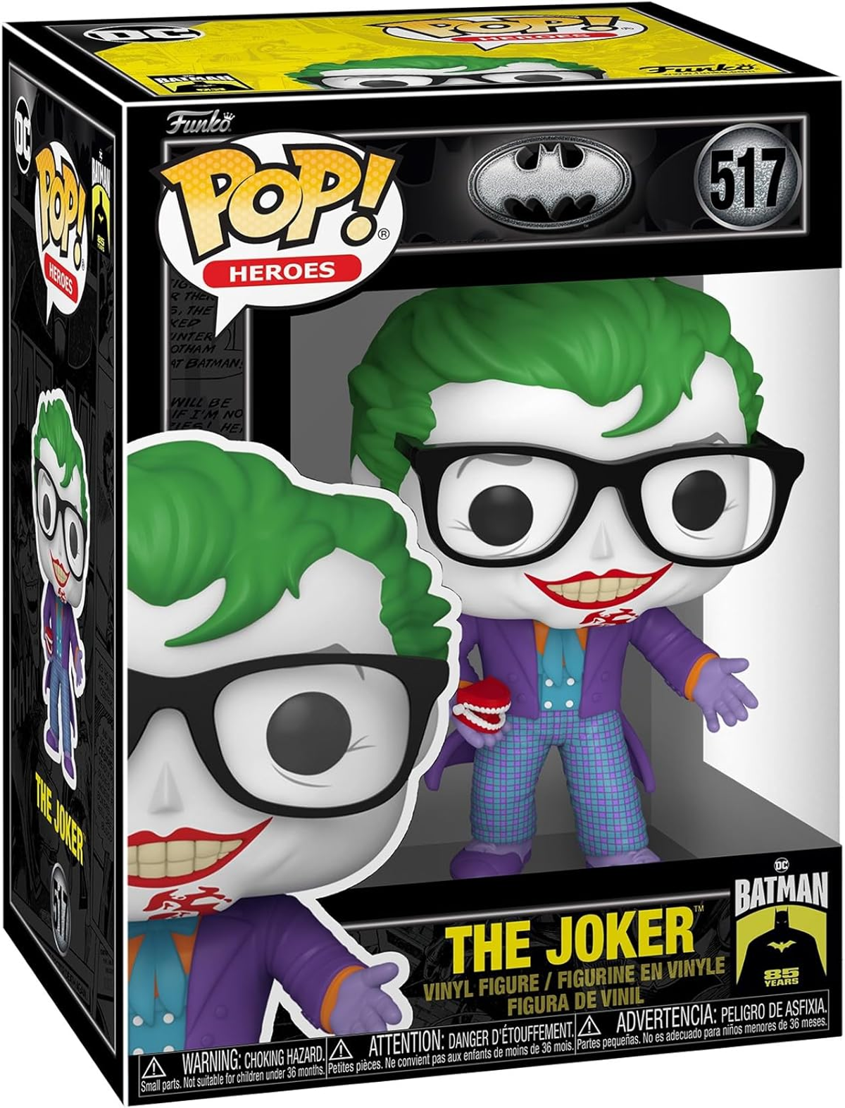 Figurine Joker Funko Pop dans une boîte. Joker avec cheveux verts, lunettes, tenant des dents.