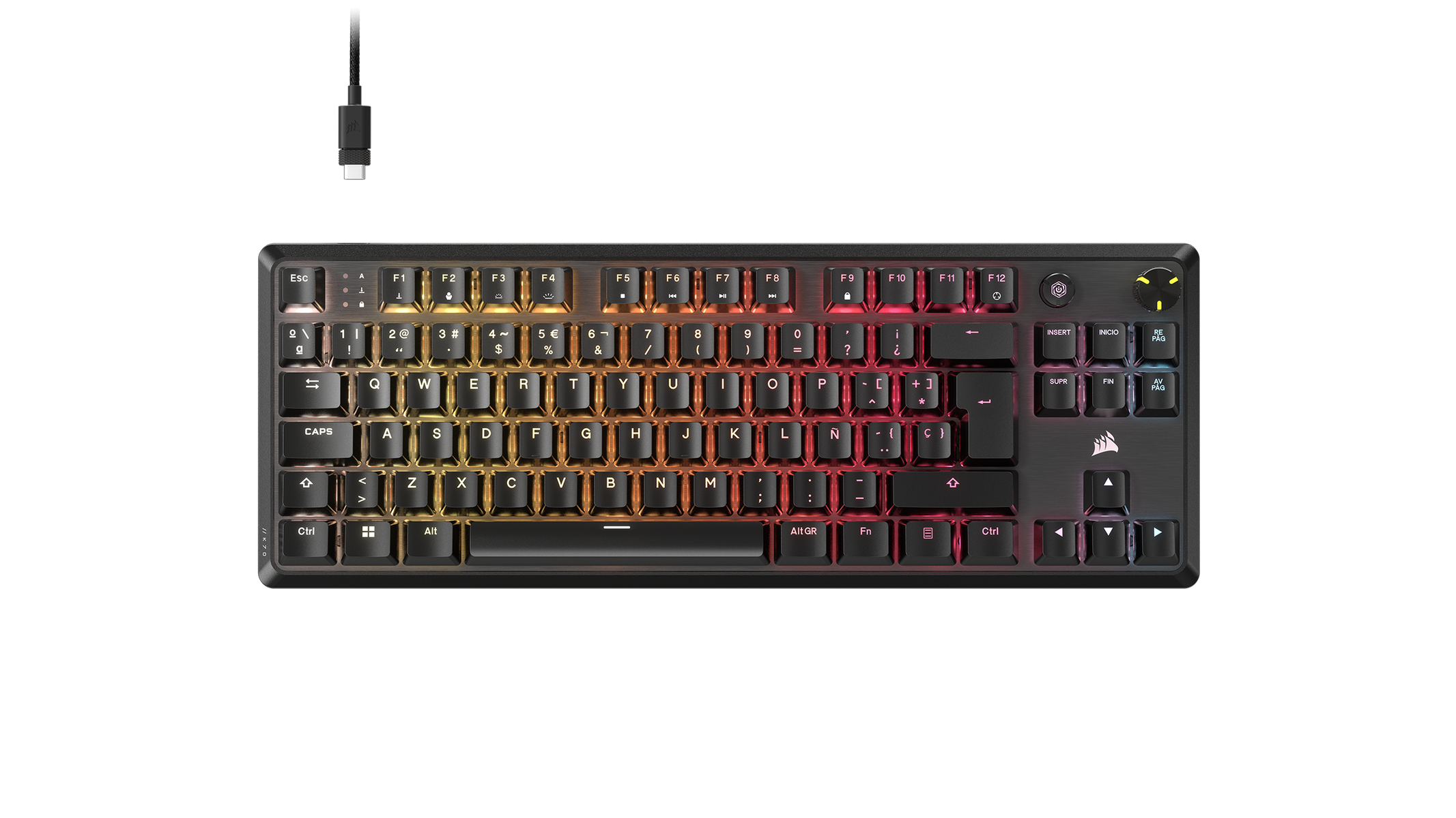 Una tastiera Corsair nera con tasti arcobaleno su superficie nera.