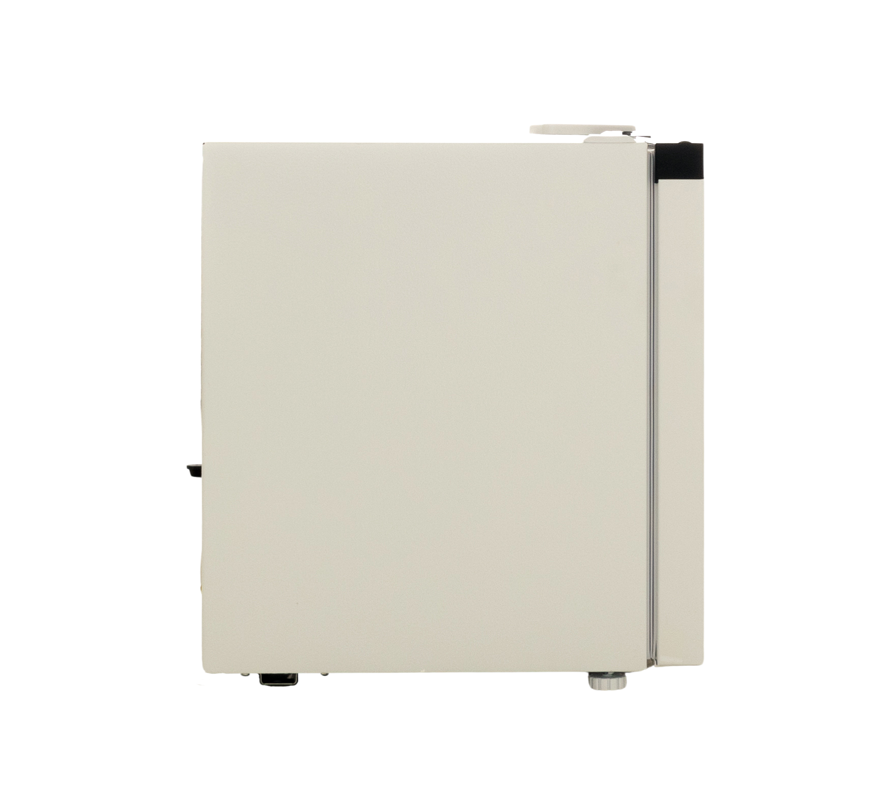 Side view of a small beige refrigerator. It is closed, showing the side panel.