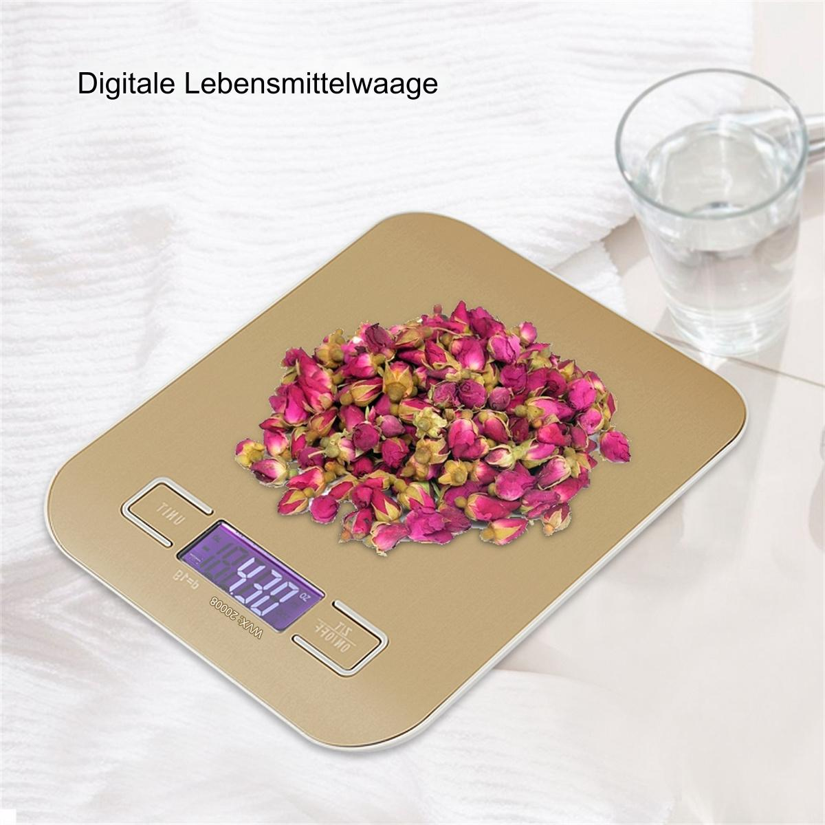 Eine digitale Küchenwaage mit Anzeige von 4,30, auf goldener Oberfläche.