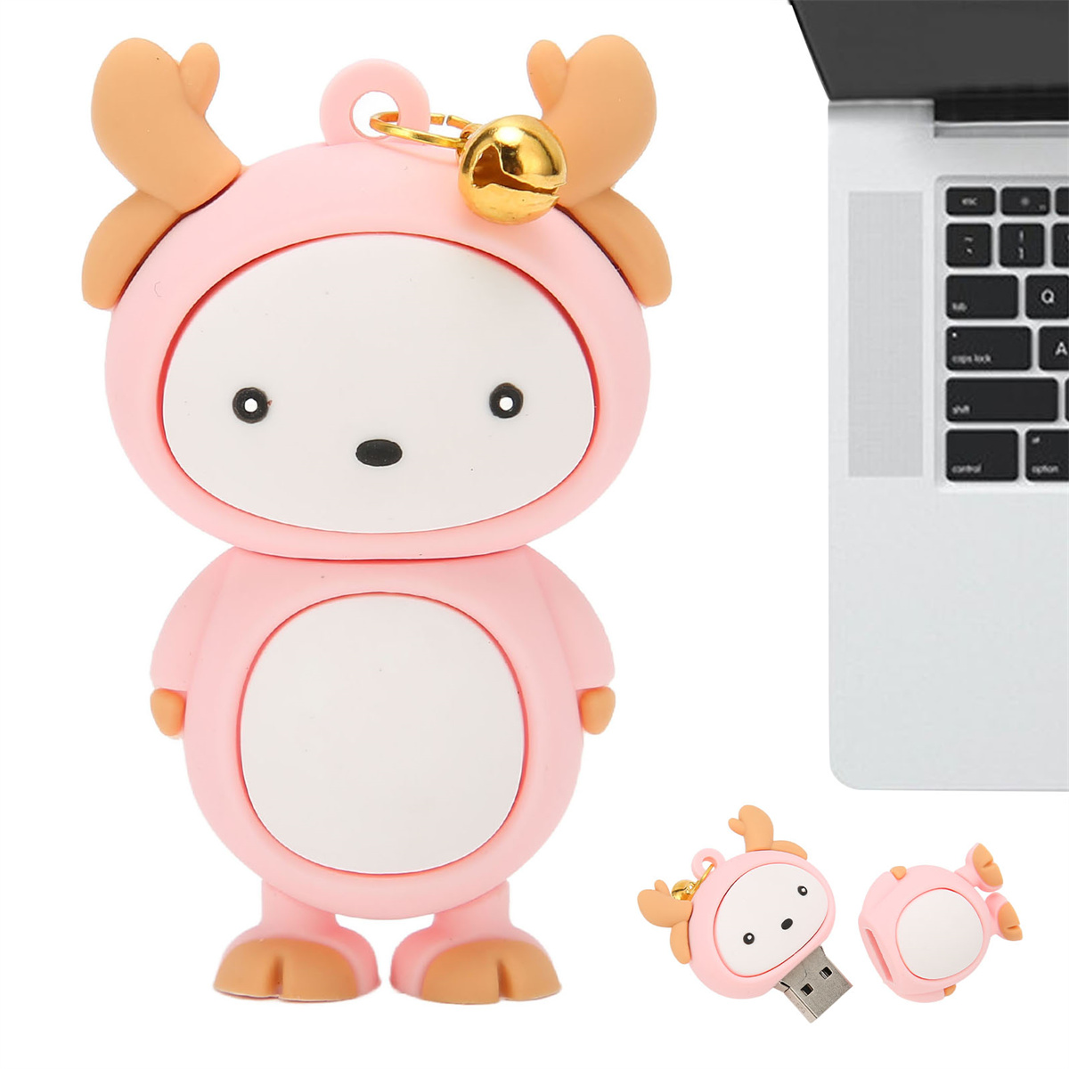 Rosa Rentier-USB-Stick und zwei kleinere. Ein Laptop ist im Hintergrund. Niedliches Design.
