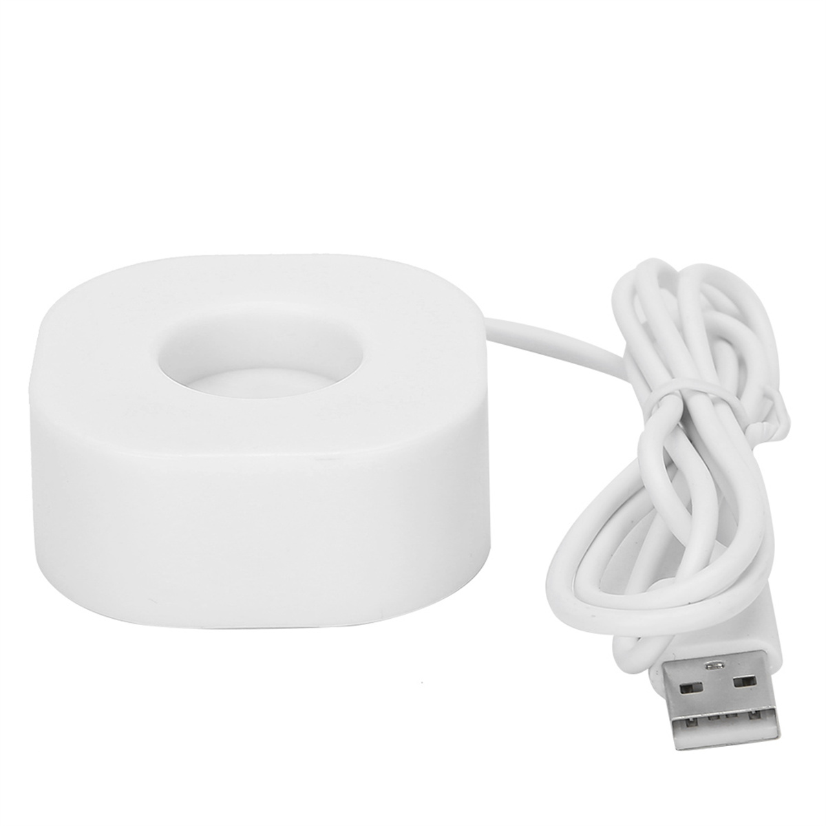Eine weiße Ladestation mit Kabel und USB-Anschluss für ein Gerät, wahrscheinlich eine Smartwatch.
