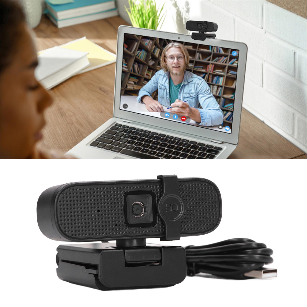 Laptop mit Videoanruf, schwarze Webcam darunter. Gesicht der Person links. Weißer Ziegelhintergrund.