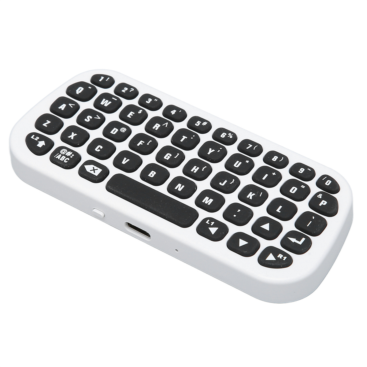Weiße Mini-Tastatur mit schwarzen Tasten. Tasten umfassen Buchstaben, Zahlen und Symbole.