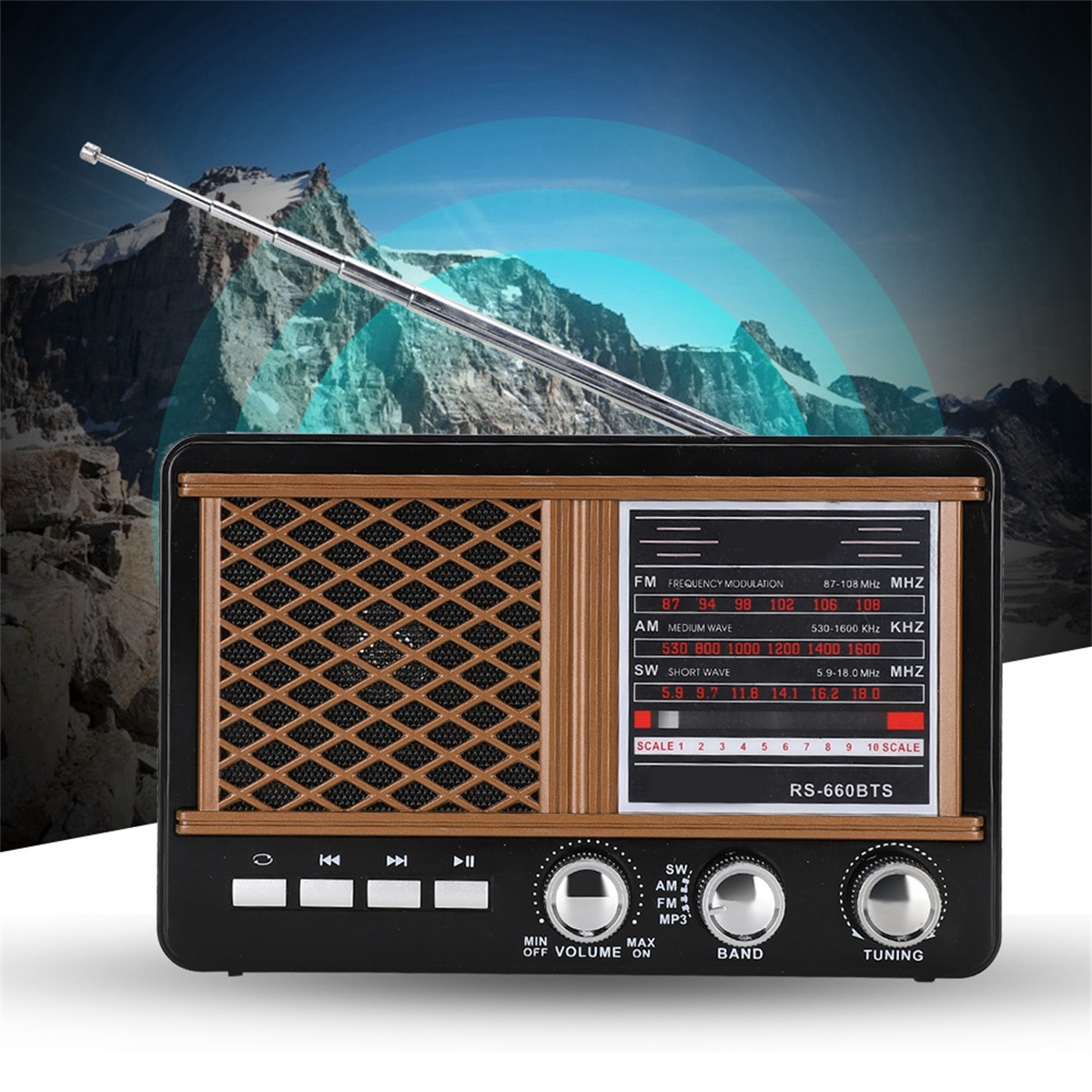Retro-Radio mit Knöpfen, Lautsprecher und brauner Lautsprecherabdeckung. Berg im Hintergrund.