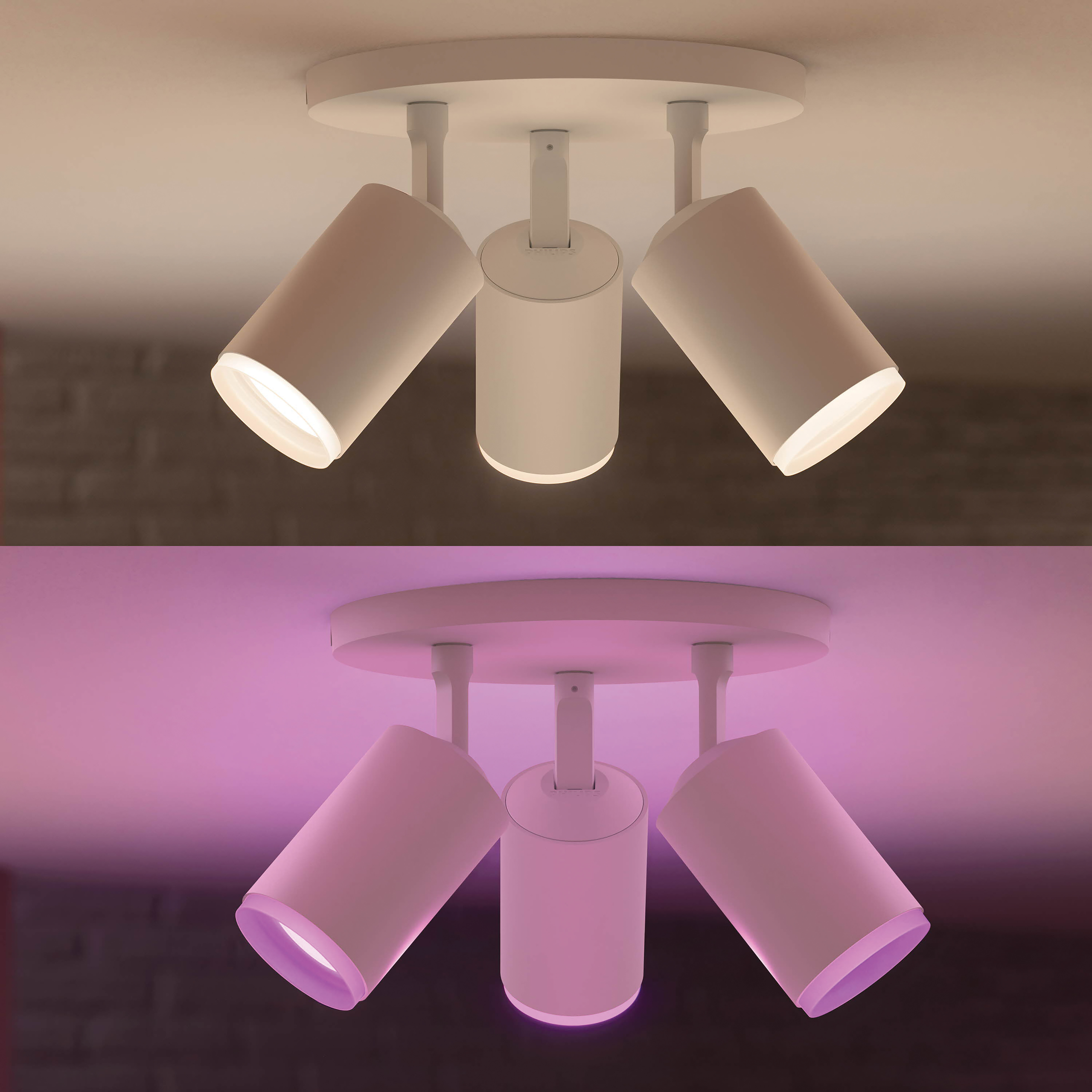 Een plafondlamp met drie spots, één schijnt wit, andere twee roze licht.