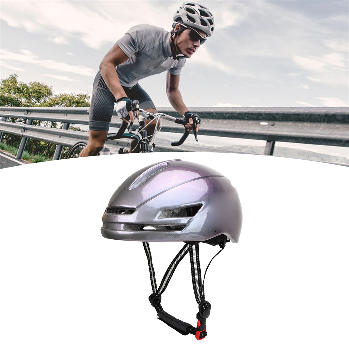 Radfahrer auf der Straße mit Helm, vor dem Helm im Bild. Himmel im Hintergrund.