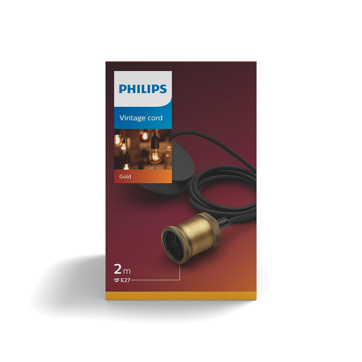 Een Philips doos met een vintage snoer en een zwarte kabel met een gouden lamphouder.