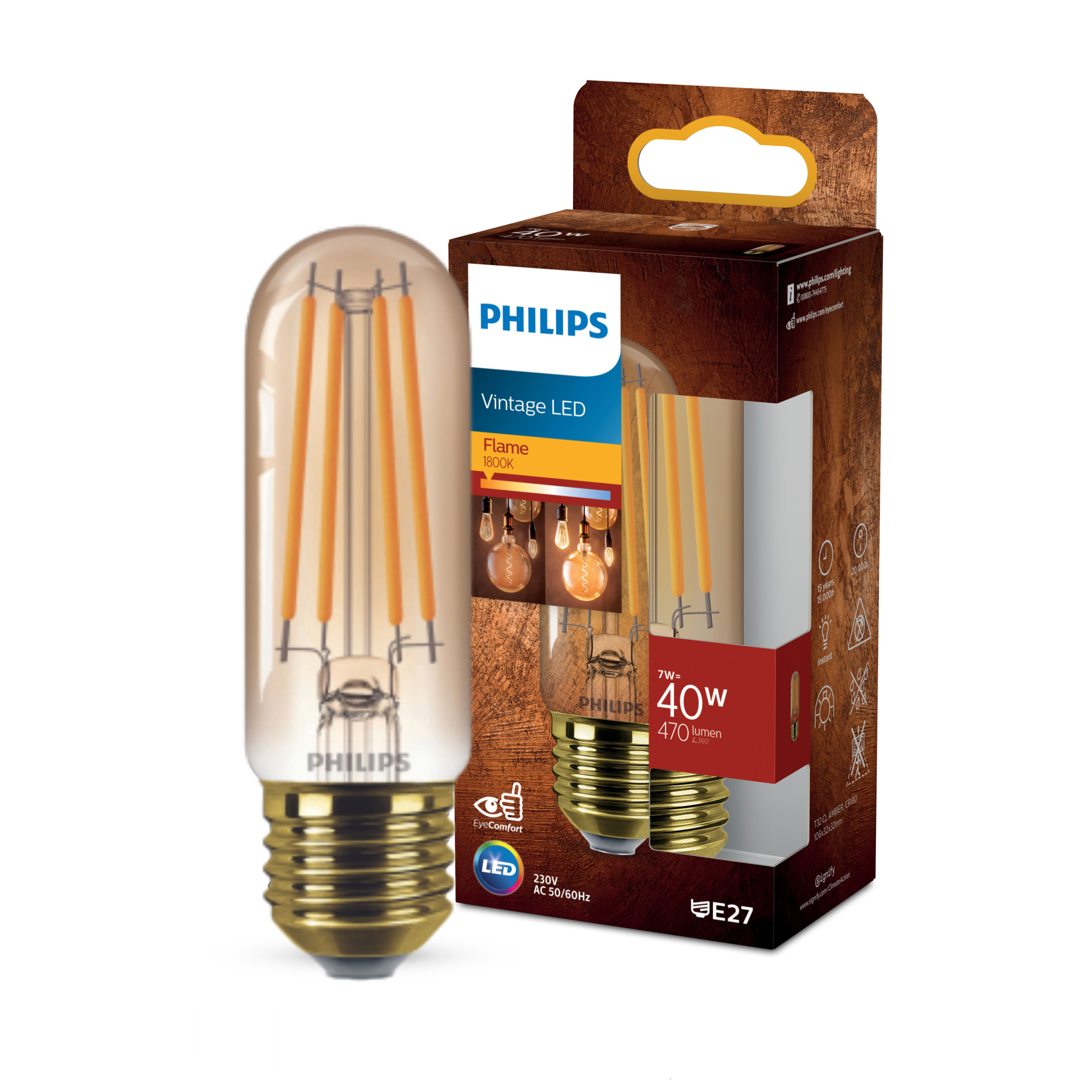 Una lampadina LED a fiamma vintage accanto alla sua scatola, su sfondo bianco.