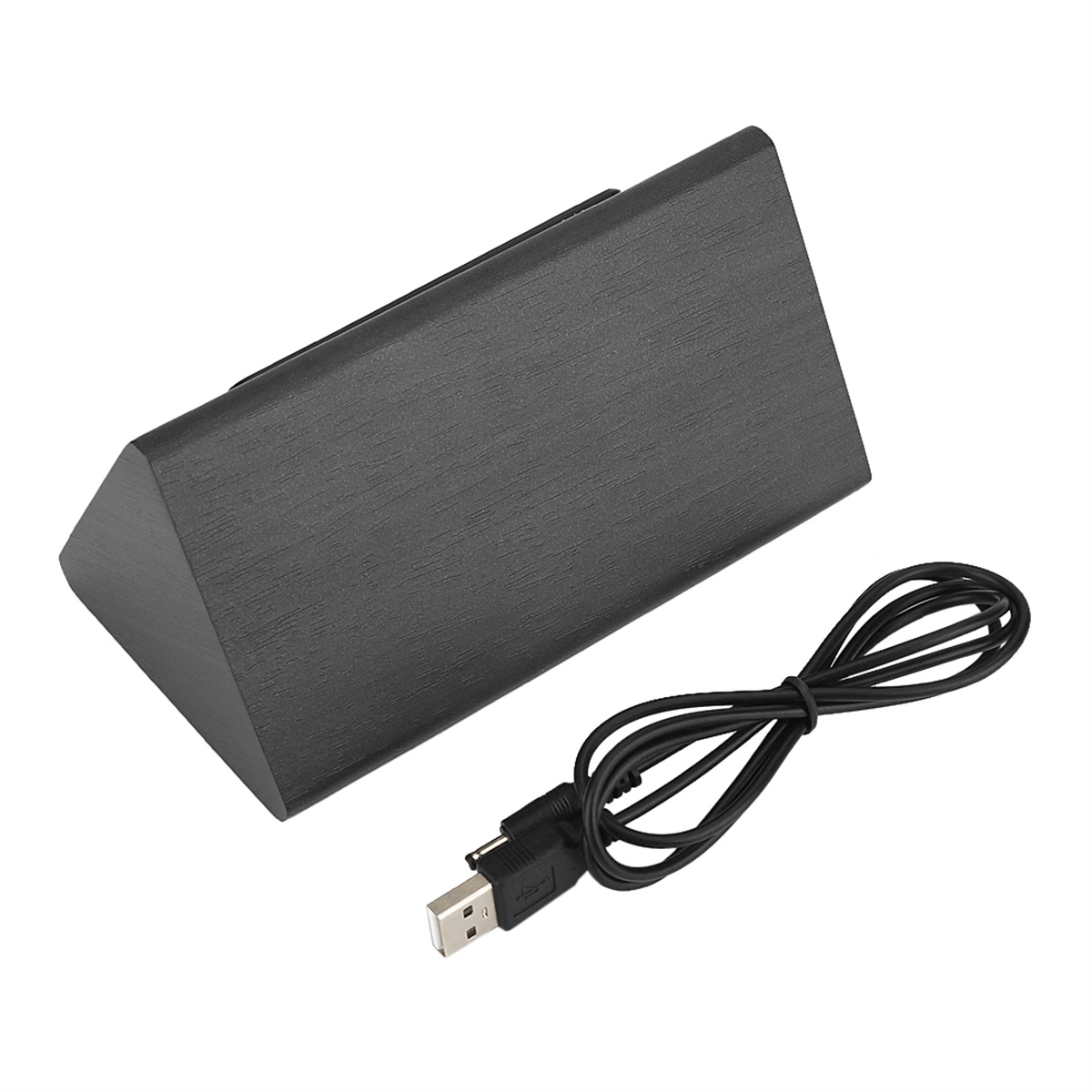 Ein schwarzes Holz in Dreiecksform mit USB-Kabel. Die Form ist ein Ständer.