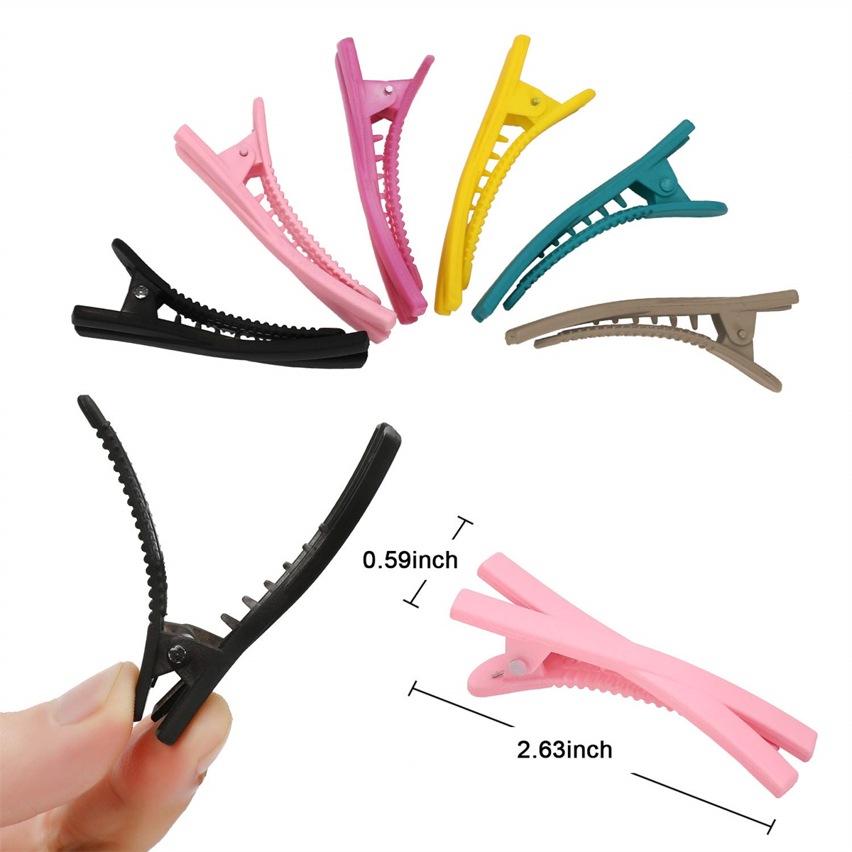 Haarspangen in verschiedenen Farben, darunter Schwarz, Rosa, Gelb, Grün und Braun, auf weißer Oberfläche.