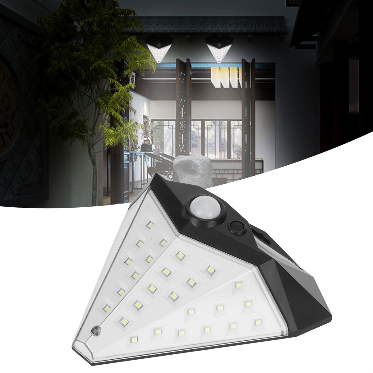 Eine solarbetriebene LED-Leuchte an einer Wand. Die Leuchte ist weiß und schwarz mit Bewegungssensor.