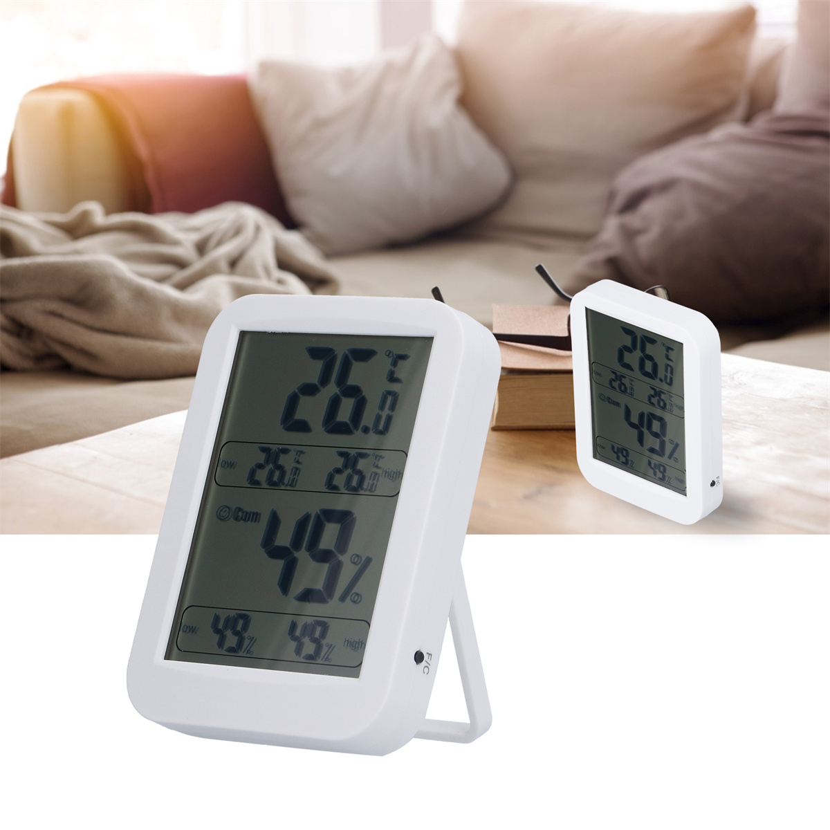 Zwei digitale Thermometer mit weißen Rahmen. Beide zeigen Temperatur- und Feuchtigkeitswerte an.