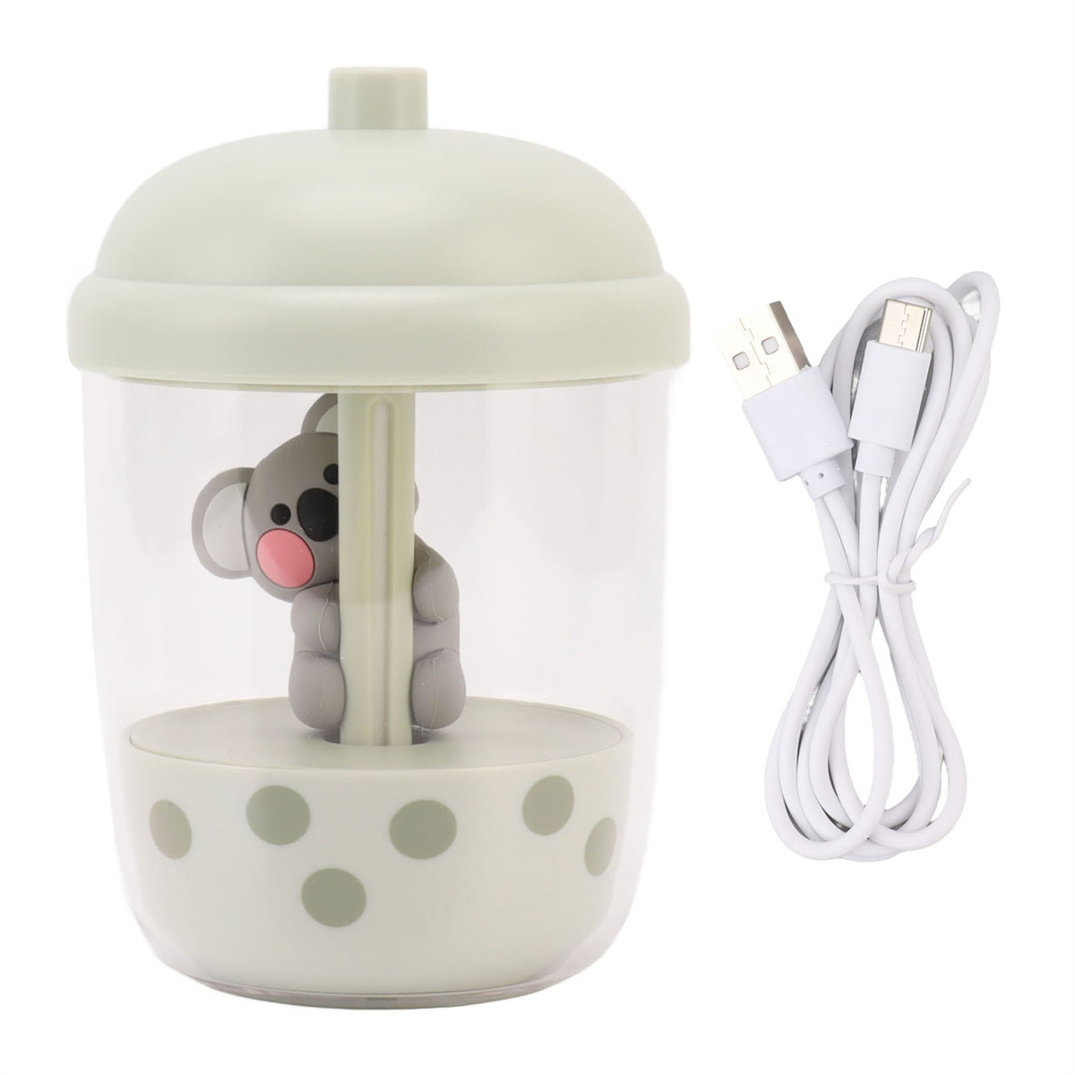 Koala-förmige Lampe in einem durchsichtigen Behälter. USB-Kabel liegt daneben.