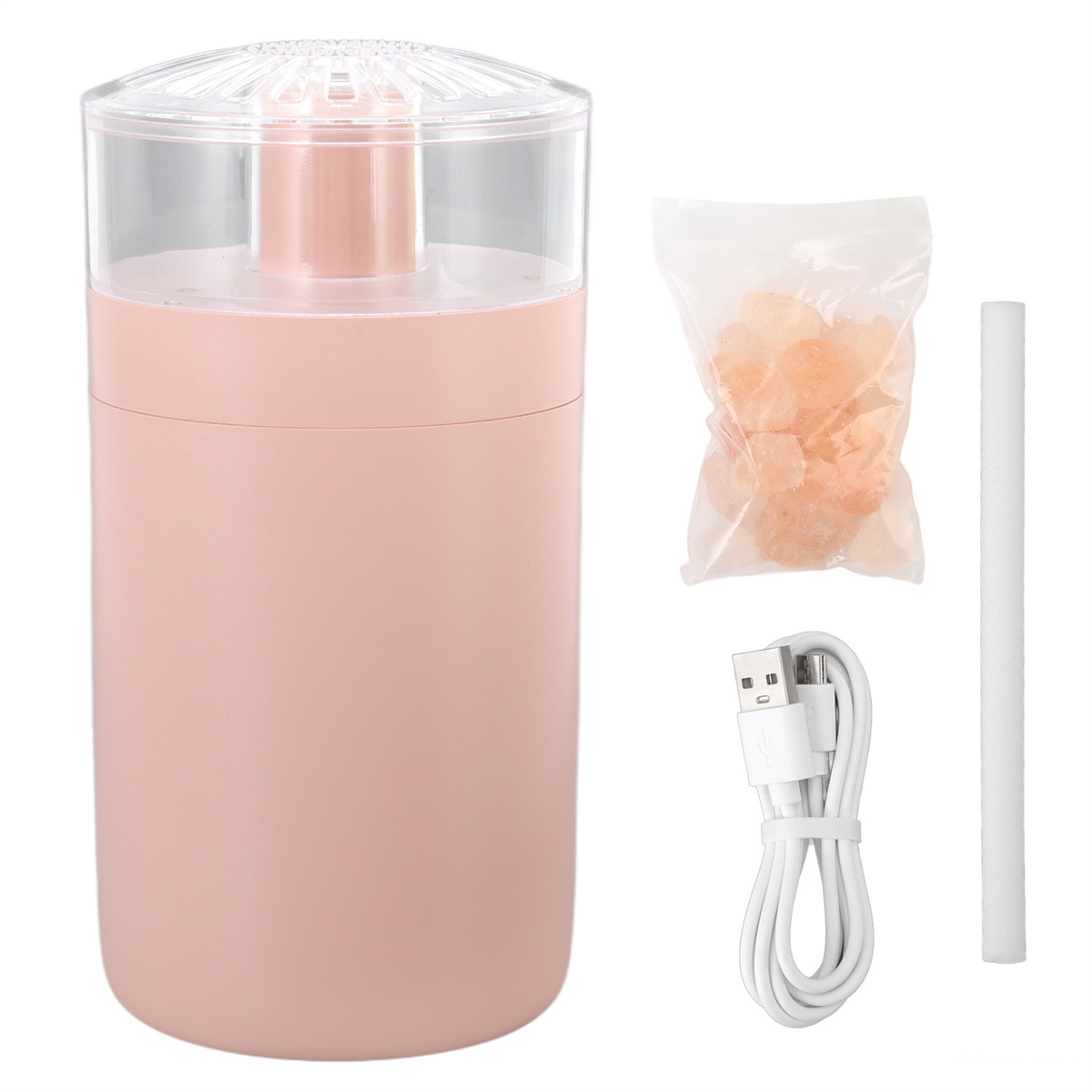 Ein rosa Luftbefeuchter mit Zubehör wie Salzkristallen, USB-Kabel und weißem Stift.