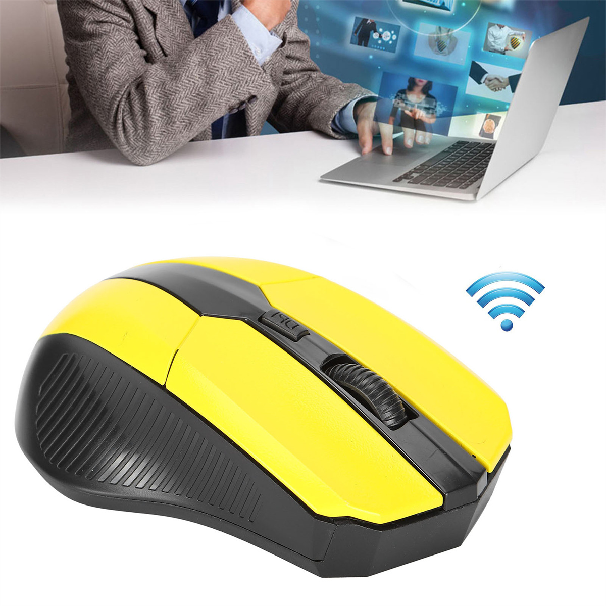 Gelbe und schwarze kabellose Maus mit Person, die im Hintergrund an einem Laptop arbeitet.