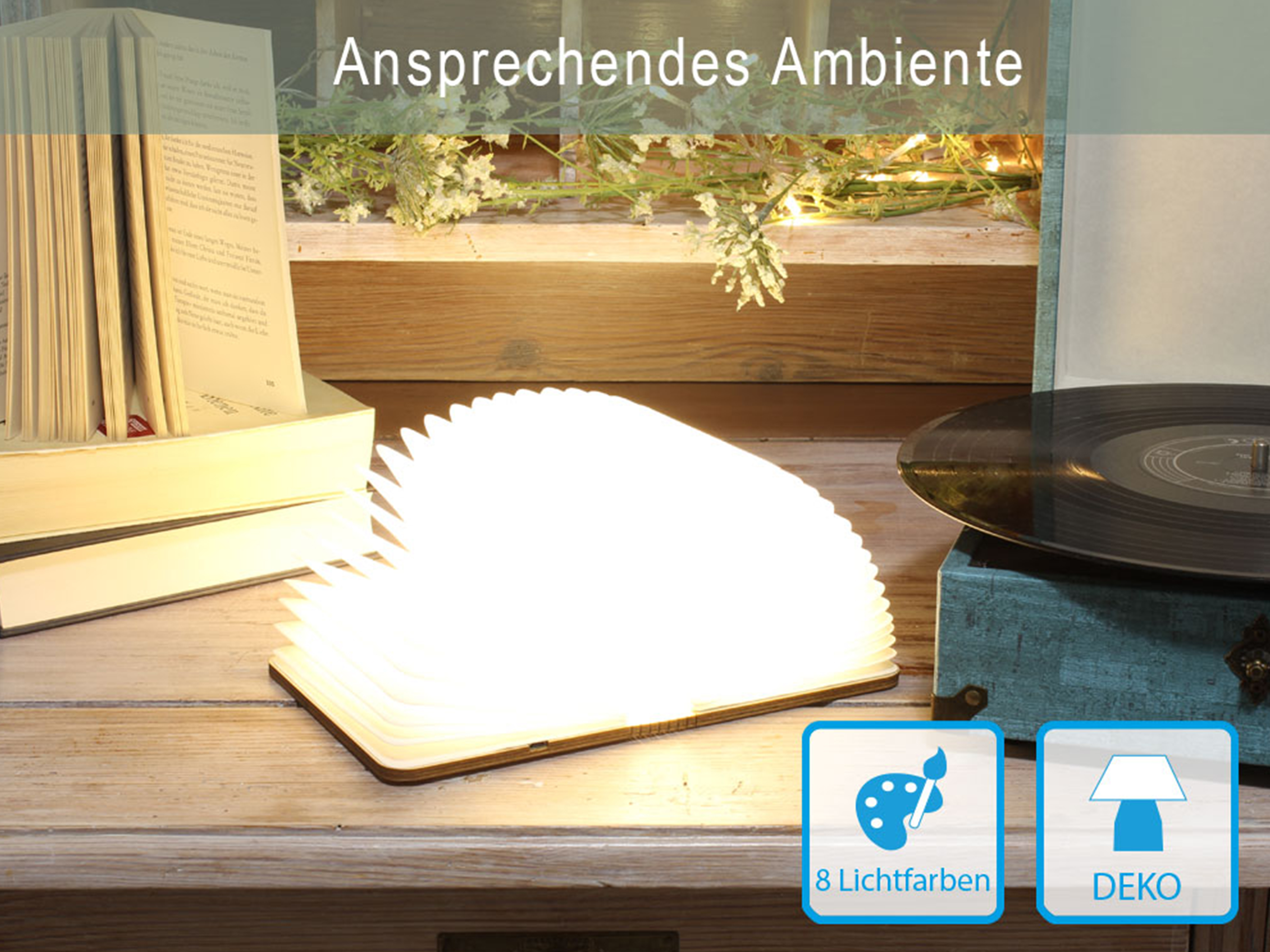 Una lampada a libro a luce bianca su un tavolo con altri oggetti, testo: 'Atmosfera accattivante'.