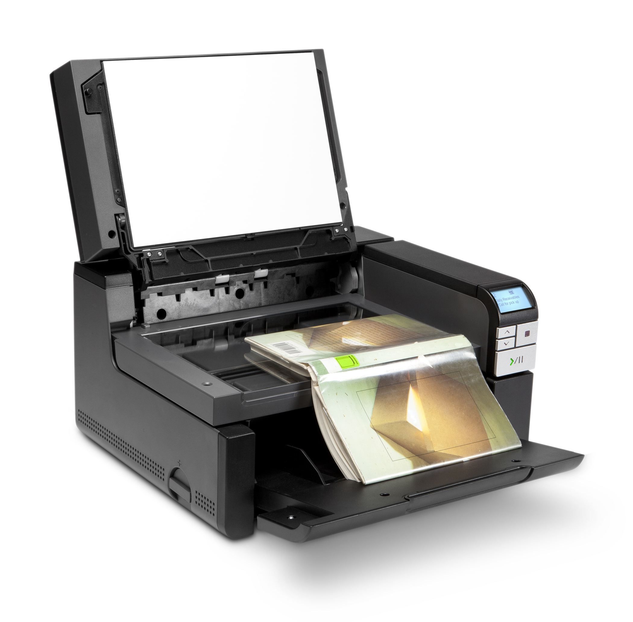 Uno scanner nero e grigio con una rivista all'interno, la parte superiore è aperta.