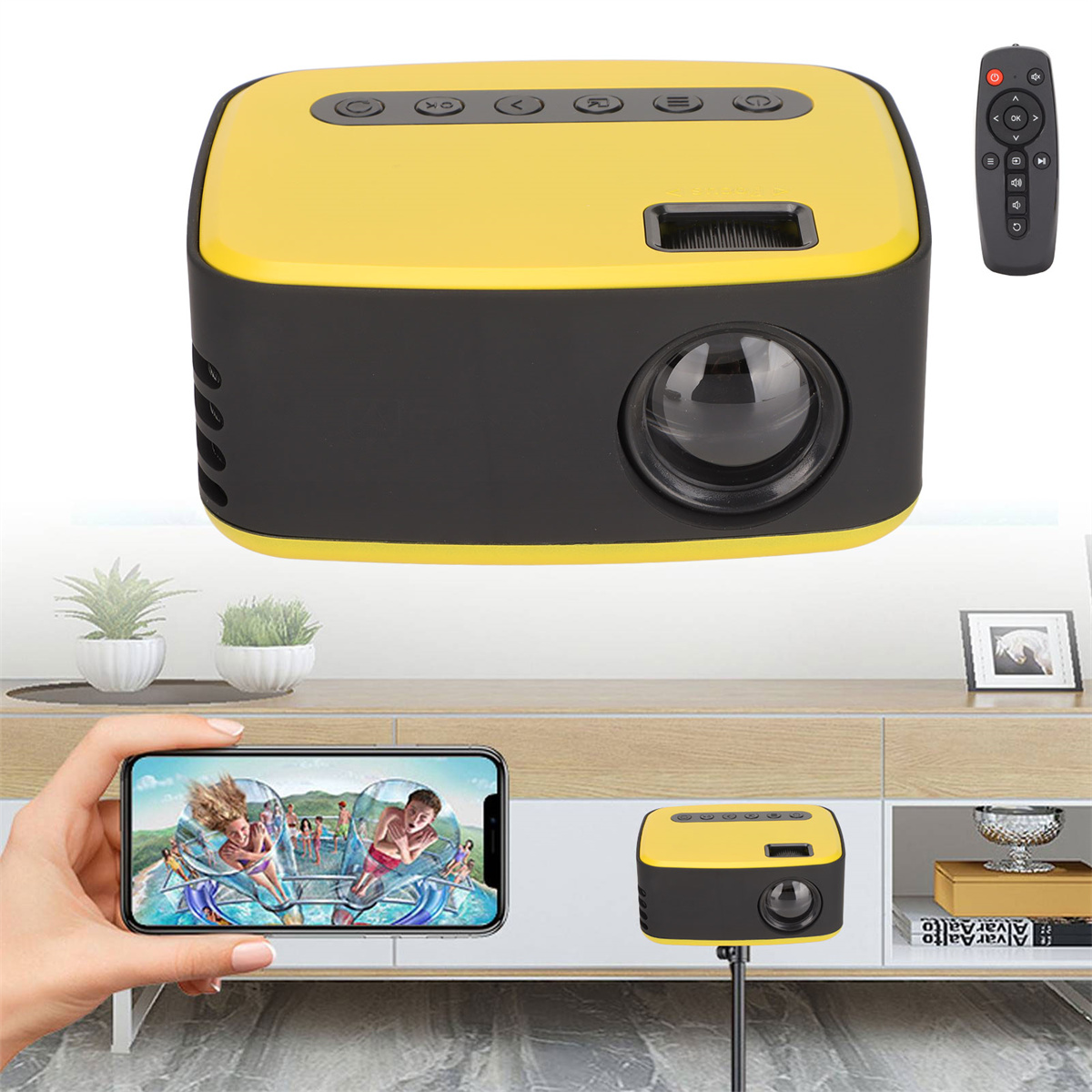 Ein gelb-schwarzer Projektor mit Fernbedienung. Ein Telefon zeigt eine Filmszene.