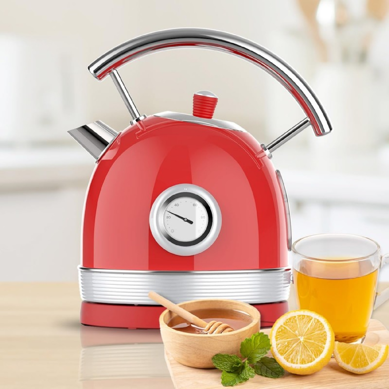 Czerwony czajnik elektryczny z termometrem, herbatą, cytryną, miodem i miętą.