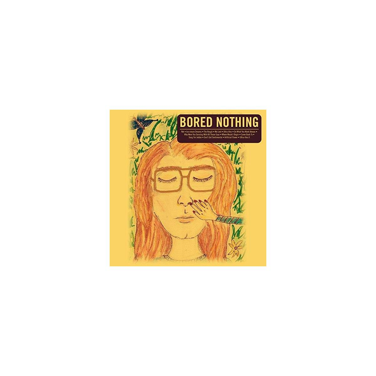 Bored Nothing albumhoes. Een persoon met een bril wordt in het gezicht aangeraakt, gele achtergrond.