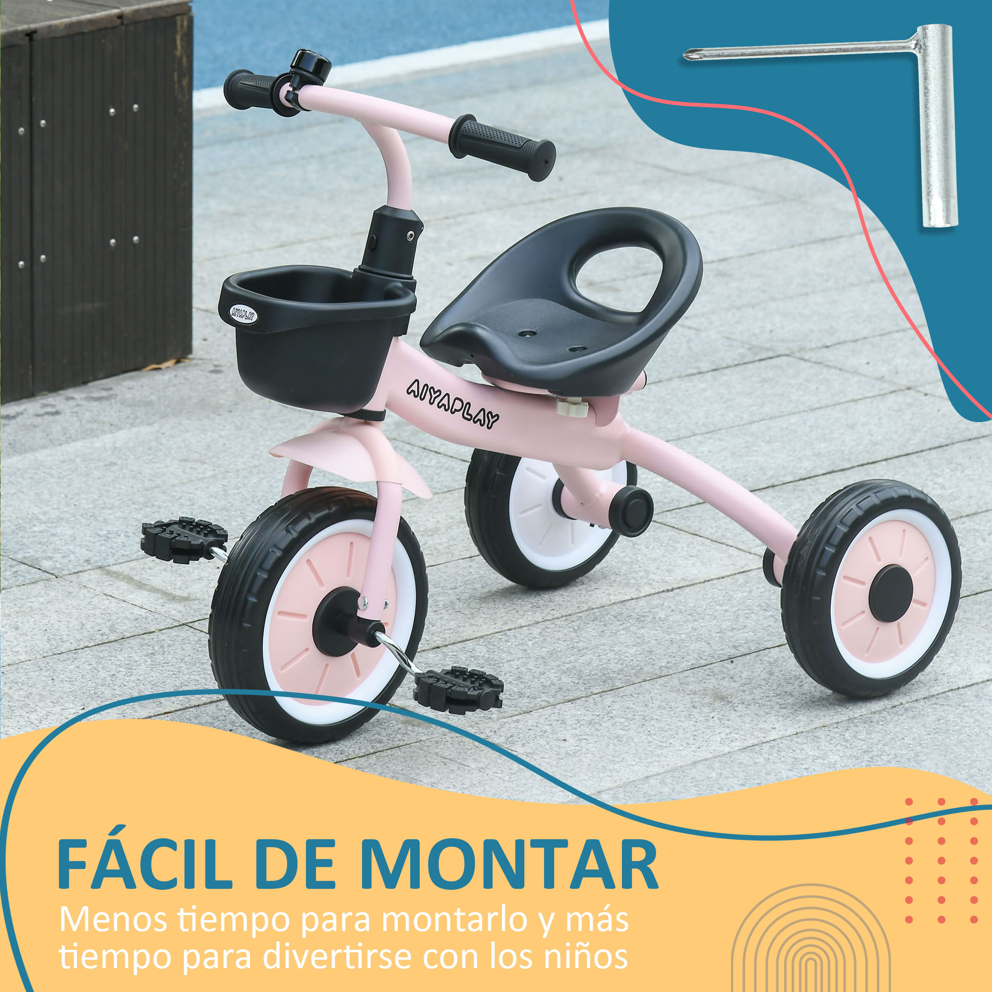 Triciclo rosa con cesta y asiento negros. Texto: Fácil de montar.