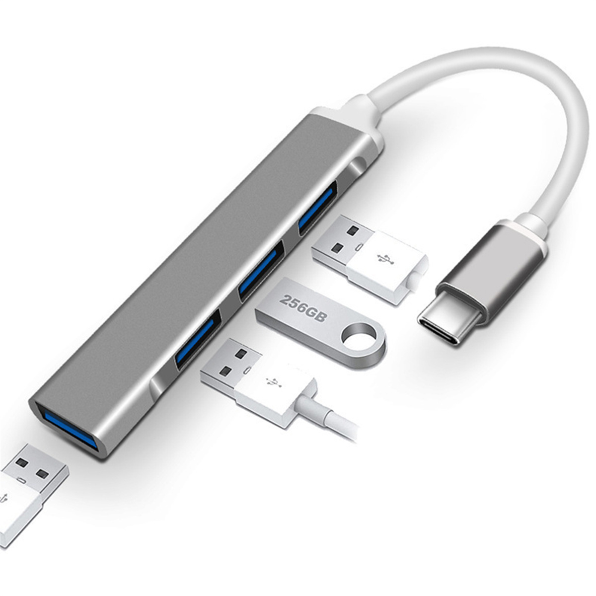 Silberner USB-Hub mit mehreren Anschlüssen. USB-Laufwerke und ein USB-C-Anschluss sind ebenfalls vorhanden.