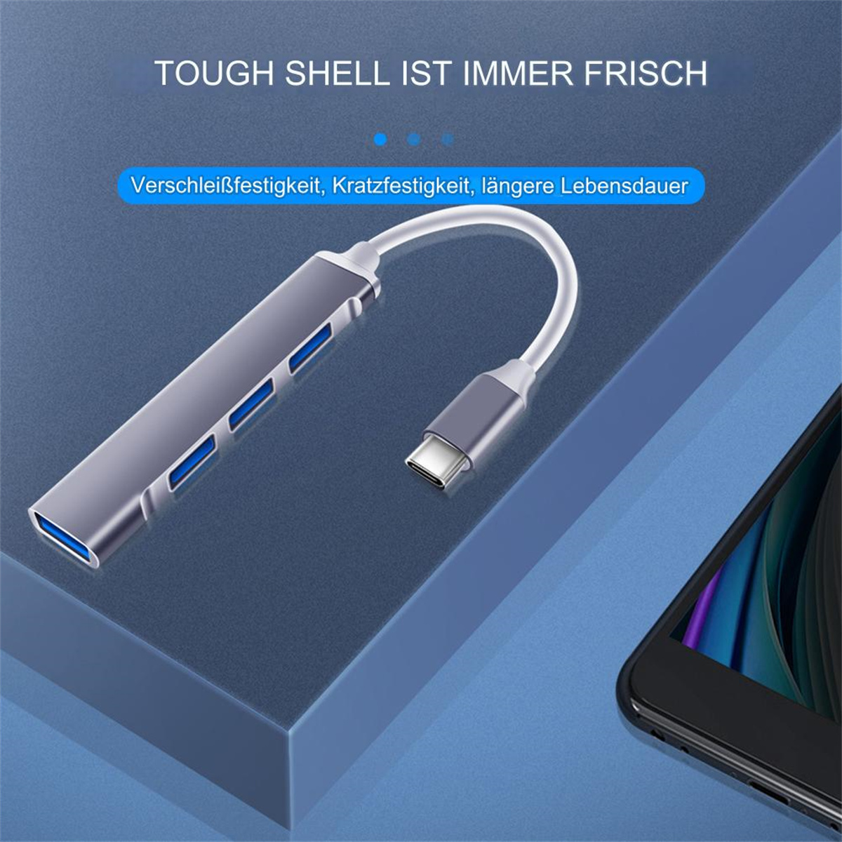 Silberner USB-Hub mit blauen Anschlüssen und einem weißen Kabel. Der Text lautet 'Tough shell is always fresh'.