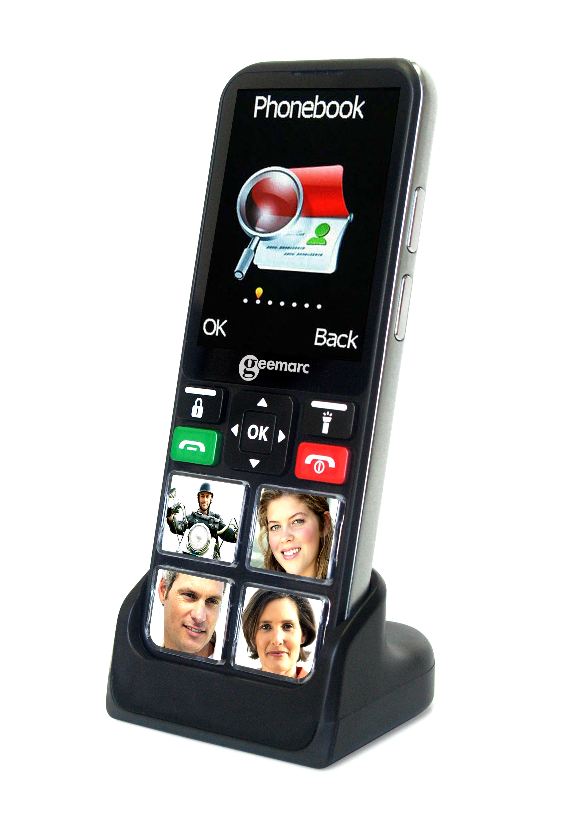 A large button phone with a screen showing images, in its charging base on a white background.