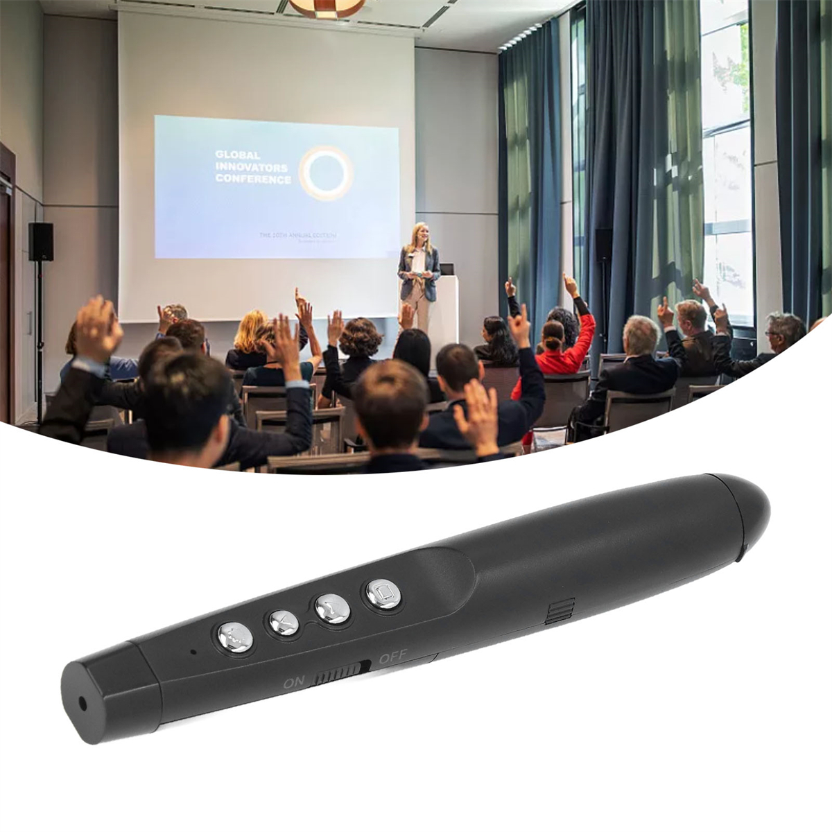 Eine schwarze Präsentationsfernbedienung mit Knöpfen, vor Redner und Publikum.