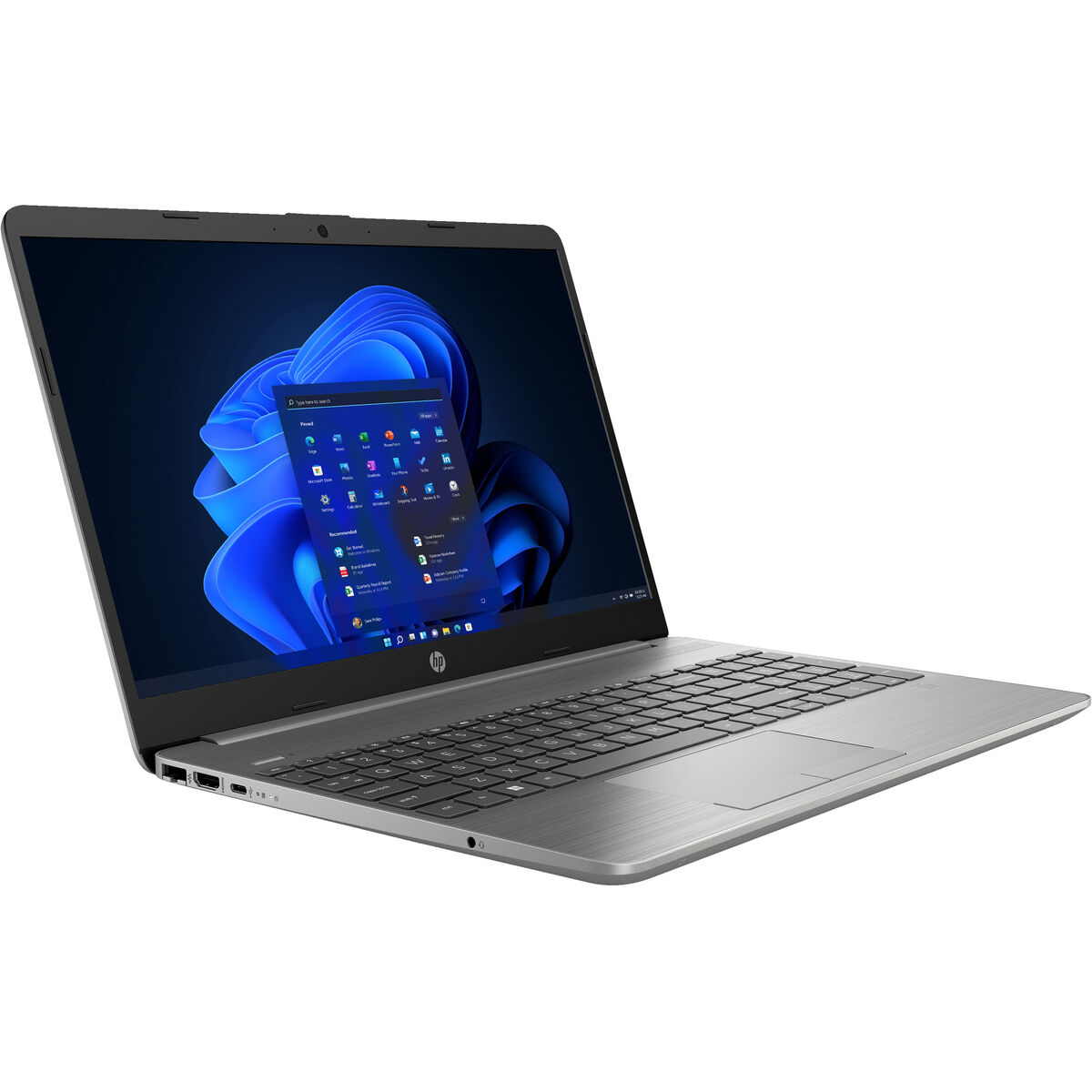 Un portátil plateado con teclado negro, abierto en ángulo, mostrando una pantalla azul.