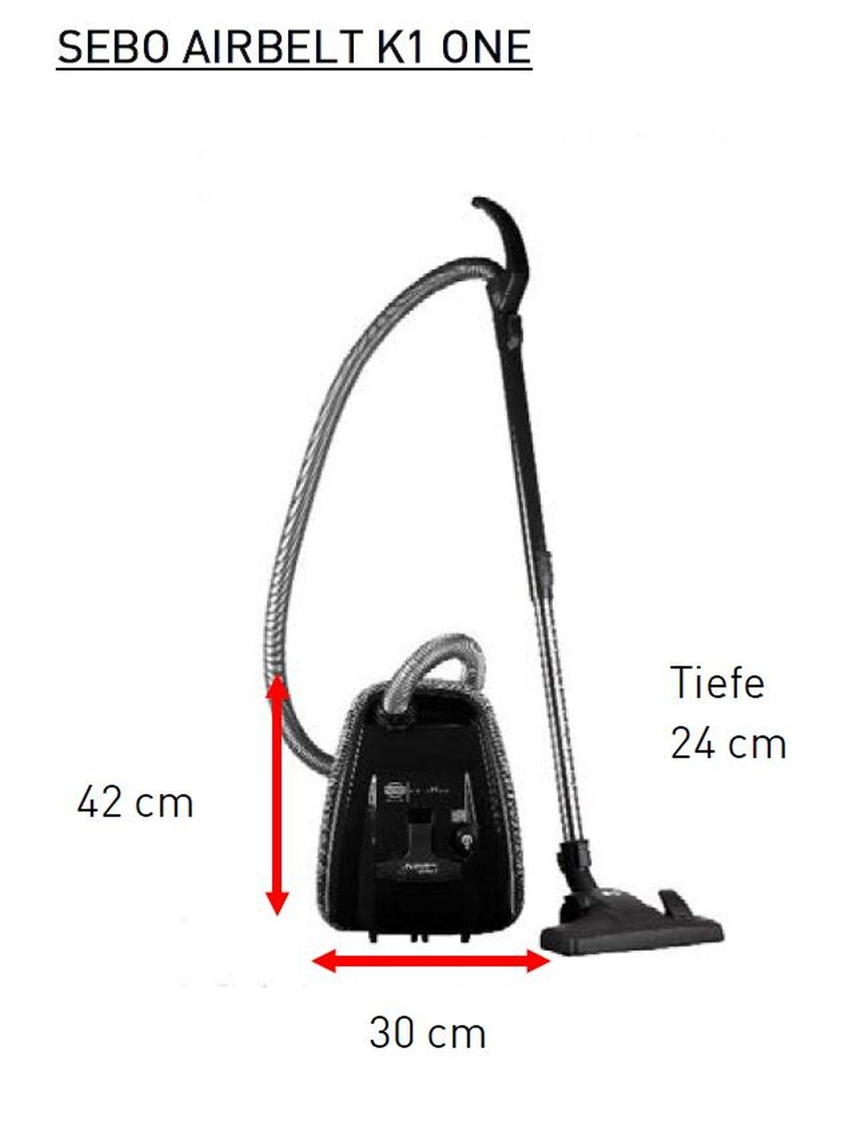 Un aspirapolvere nero con dimensioni indicate, con il nome 'SEBO AIRBELT K1 ONE'.
