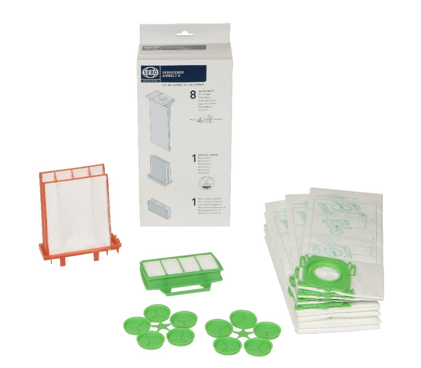 Staubsaugerbeutel und Filter in einer Box. Verschiedene Teile werden neben der Box angezeigt.