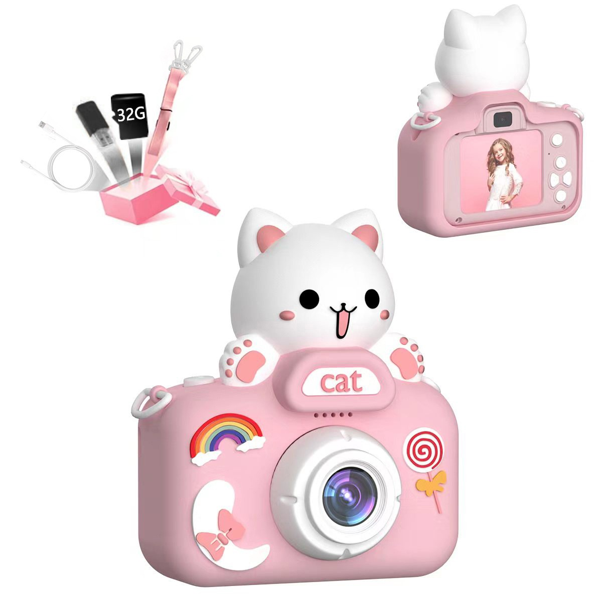 Różowy aparat w kształcie kota z akcesoriami. Pokazuje naklejkę z tęczą, zdjęcie dziewczynki i kartę 32GB.
